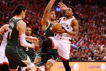 TORONTO, ONTARIO - MAY 21: Kyle Lowry #7 of the Toronto Raptors drives to the basket during the second half against the Milwaukee Bucks in game four of the NBA Eastern Conference Finals at Scotiabank Arena on May 21, 2019 in Toronto, Canada. NOTE TO USER: