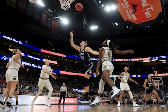 TAMPA, FLORIDA - APRIL 05:  Katie Lou Samuelson #33 of the UConn Huskies attempts a shot against the Notre Dame Fighting Irish during the third quarter in the semifinals of the 2019 NCAA Women's Final Four at Amalie Arena on April 05, 2019 in Tampa, Flori