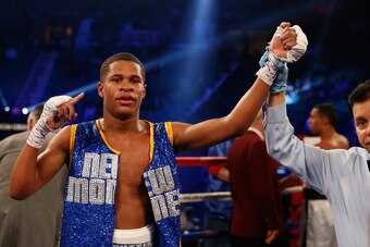 LAS VEGAS, NEVADA - APRIL 09:  Devin Haney celebrates his victory over Rafael Vazquez in their super featherweight fight on April 9, 2016 at MGM Grand Garden Arena in Las Vegas, Nevada.  (Photo by Christian Petersen/Getty Images)