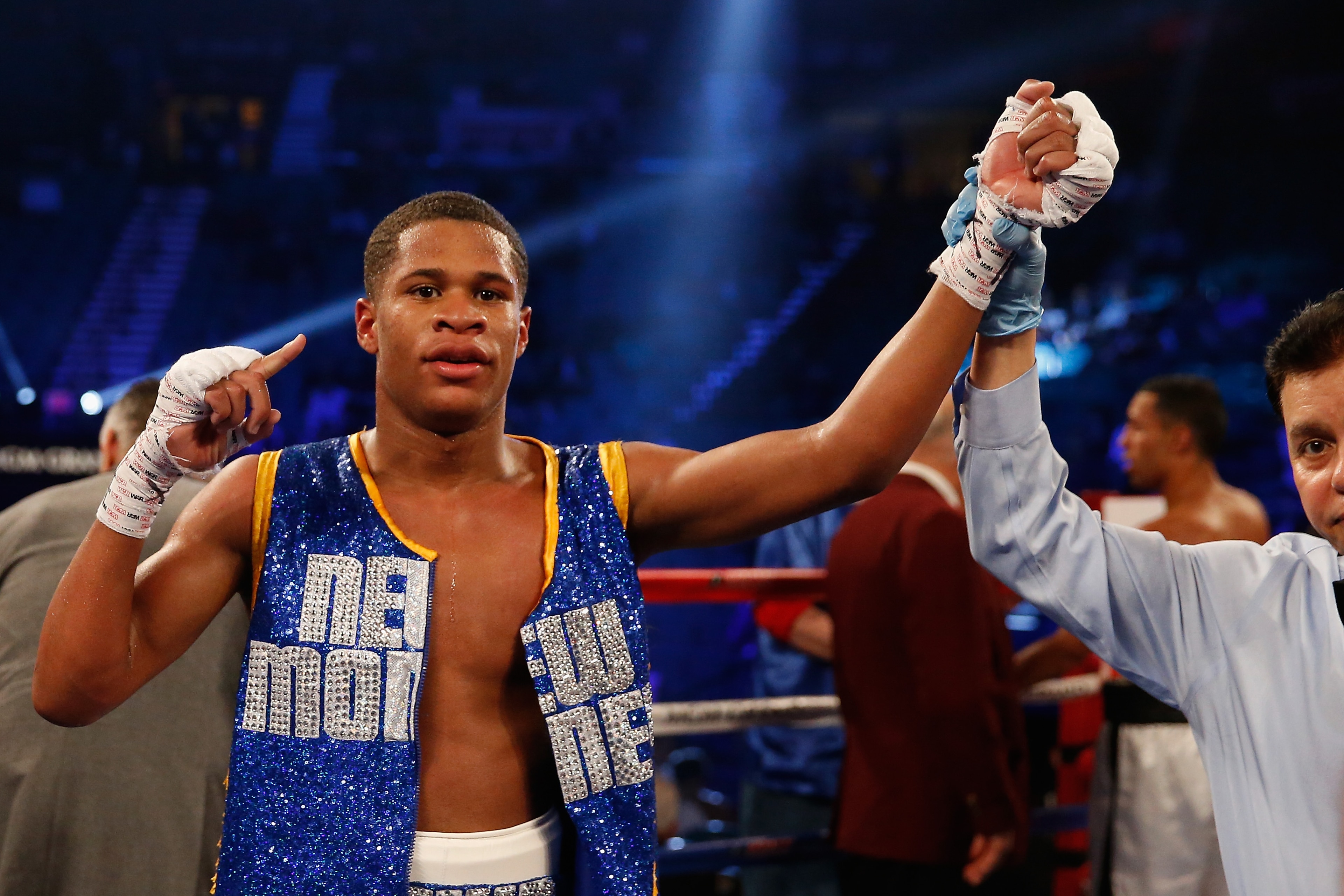 LAS VEGAS, NEVADA - APRIL 09:  Devin Haney celebrates his victory over Rafael Vazquez in their super featherweight fight on April 9, 2016 at MGM Grand Garden Arena in Las Vegas, Nevada.  (Photo by Christian Petersen/Getty Images)
