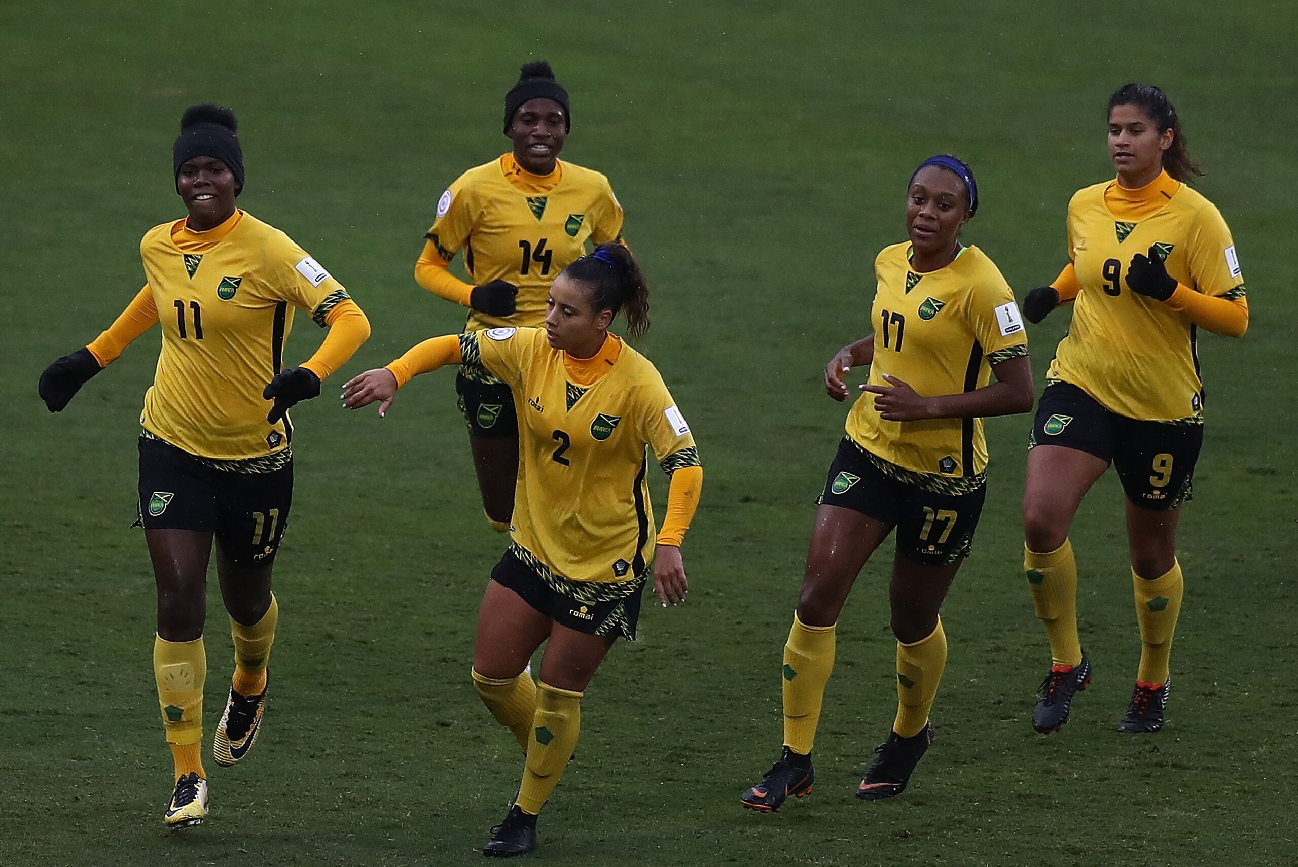 FRISCO, TX - OCTOBER 17:  Khadija Shaw #11, Lauren Silver #2, Deneisha Blackwood #14, Allyson Swaby #17 and Marlo Sweatman #9 of Jamaica celebrate a goal against Panama during the CONCACAF Women's Championship third place match at Toyota Stadium on Octobe