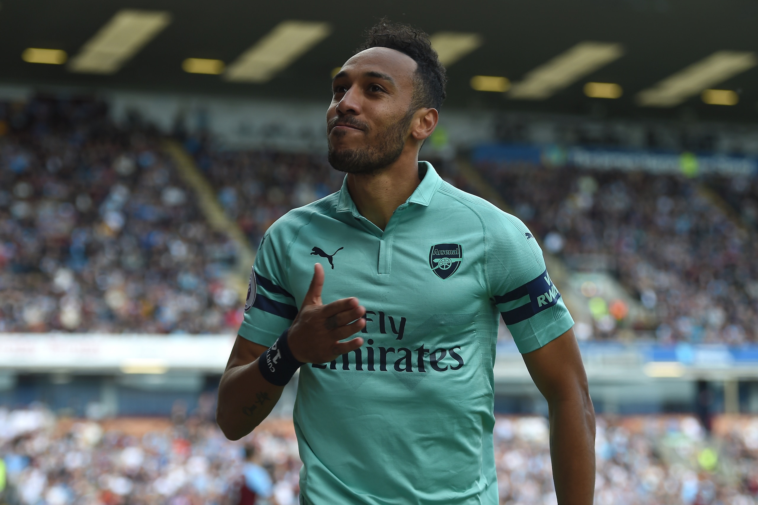 BURNLEY, ENGLAND - MAY 12: Pierre-Emerick Aubameyang of Arsenal celebrates after scoring his team's first goal during the Premier League match between Burnley FC and Arsenal FC at Turf Moor on May 12, 2019 in Burnley, United Kingdom. (Photo by Harriet Lan BURNLEY, ENGLAND - MAY 12: Pierre-Emerick Aubameyang of Arsenal celebrates after scoring his team's first goal during the Premier League match between Burnley FC and Arsenal FC at Turf Moor on May 12, 2019 in Burnley, United Kingdom. (Photo by Harriet Lan