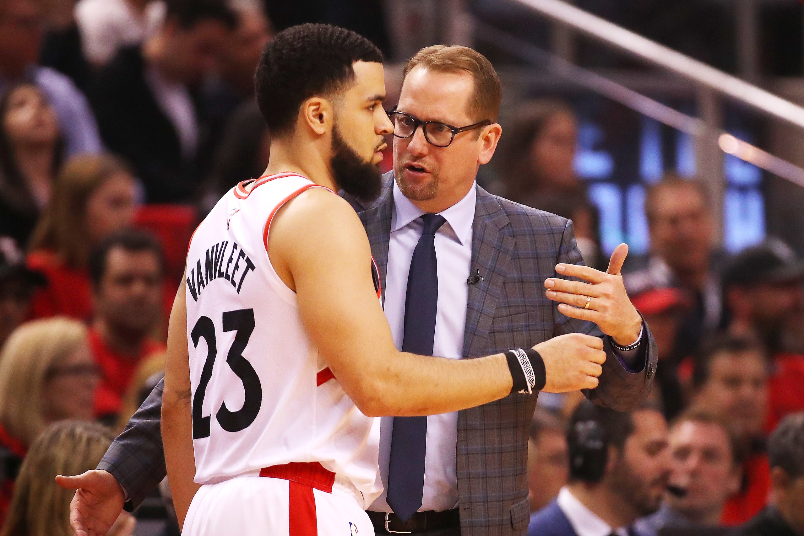 TORONTO, ONTARIO - MAY 25: Fred VanVleet #23 of the Toronto Raptors talks to head coach Nick Nurse during the first half against the Milwaukee Bucks in game six of the NBA Eastern Conference Finals at Scotiabank Arena on May 25, 2019 in Toronto, Canada. N