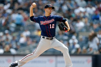 NEW YORK, NEW YORK - MAY 04:   Jake Odorizzi #12 of the Minnesota Twins in action against the New York Yankees at Yankee Stadium on May 04, 2019 in the Bronx borough of New York City. The Twins defeated the Yankees 7-3. (Photo by Jim McIsaac/Getty Images)
