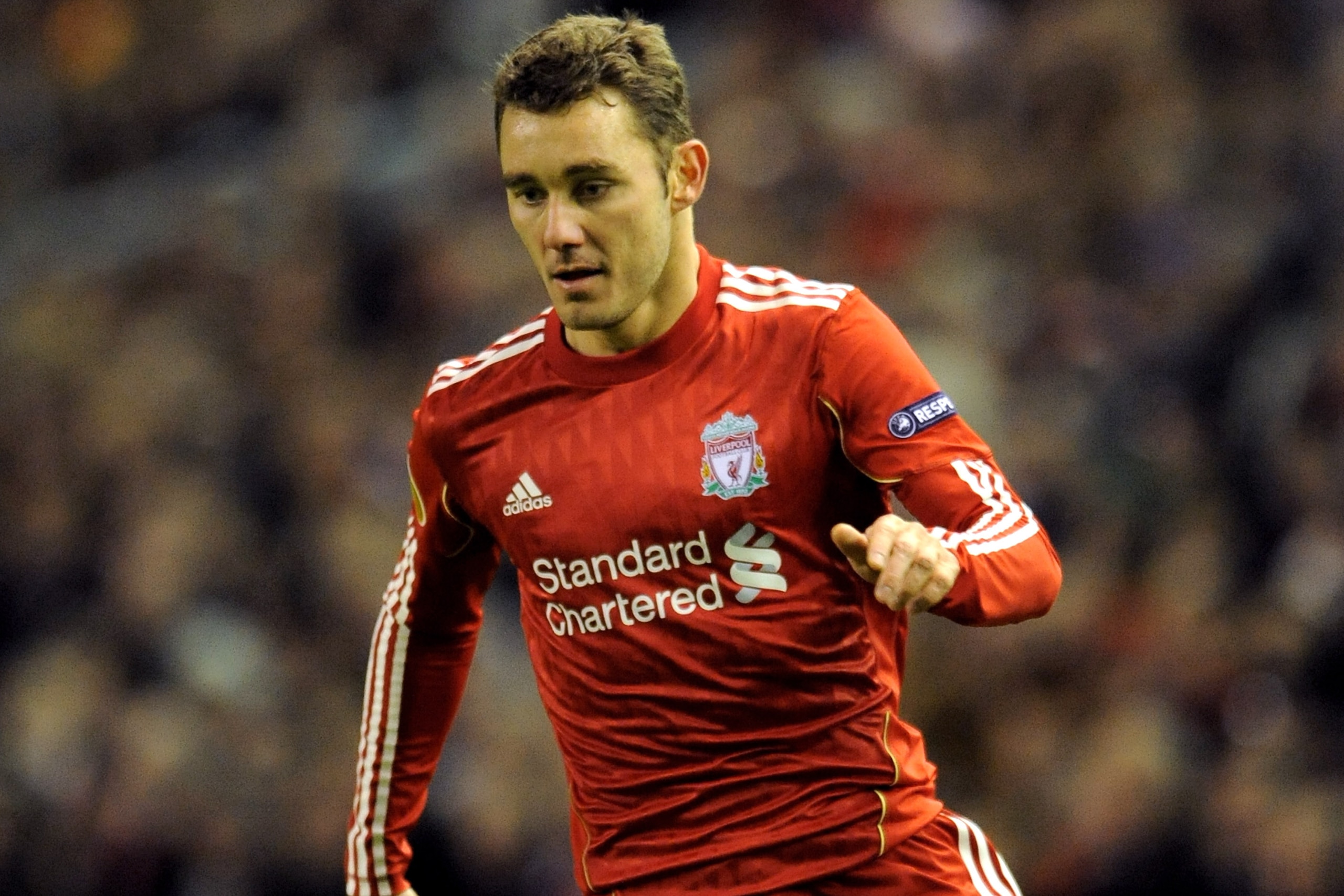 LIVERPOOL, ENGLAND - DECEMBER 15:  Fabio Aurelio of Liverpool runs with the ball during the UEFA Europa League Group K match between Liverpool and FC Utrecht at Anfield on December 15, 2010 in Liverpool, England.  (Photo by Clint Hughes/Getty Images)