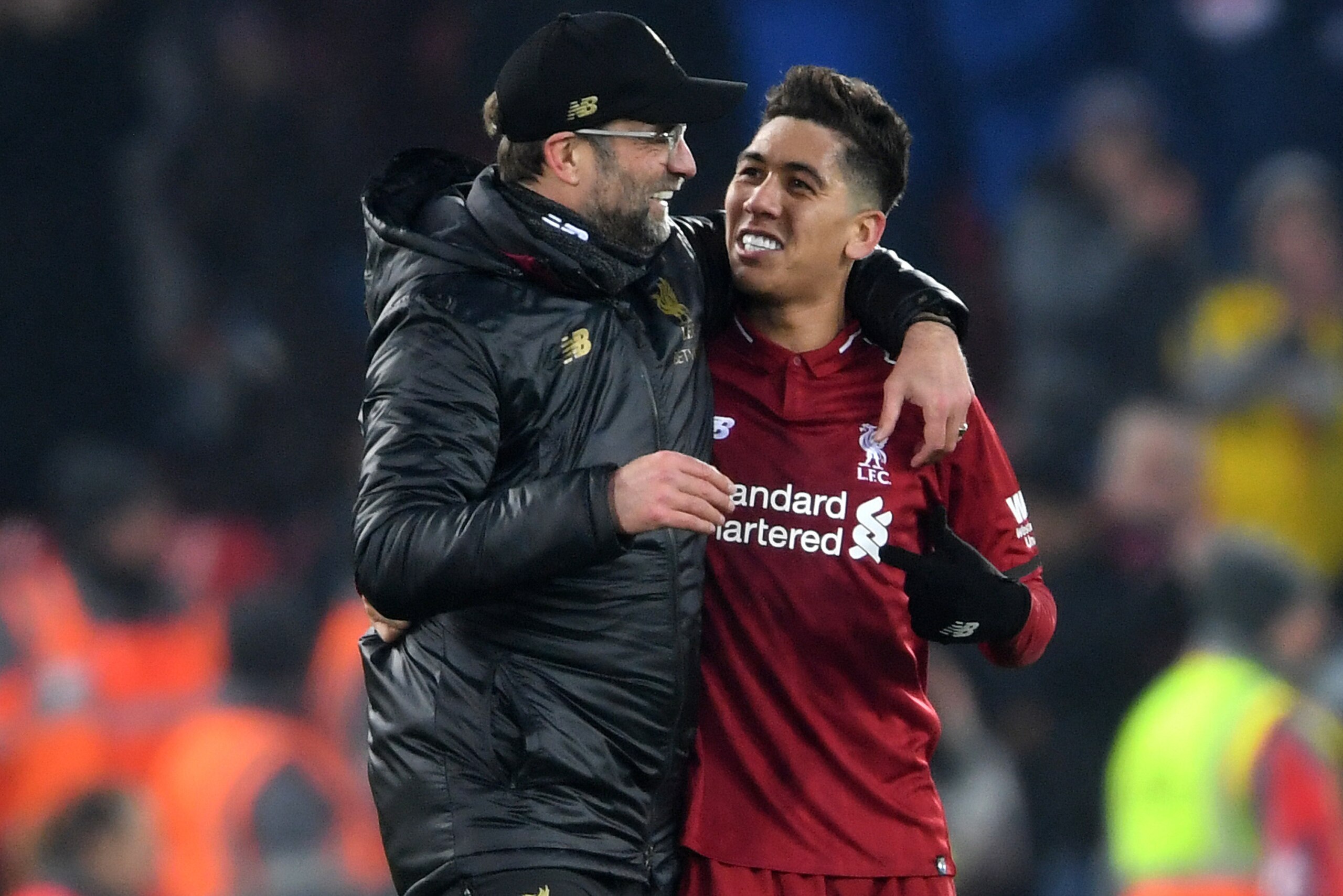 LIVERPOOL, ENGLAND - JANUARY 19:  Jurgen Klopp, Manager of Liverpool congratulates Roberto Firmino of Liverpool following the Premier League match between Liverpool FC and Crystal Palace at Anfield on January 19, 2019 in Liverpool, United Kingdom.  (Photo