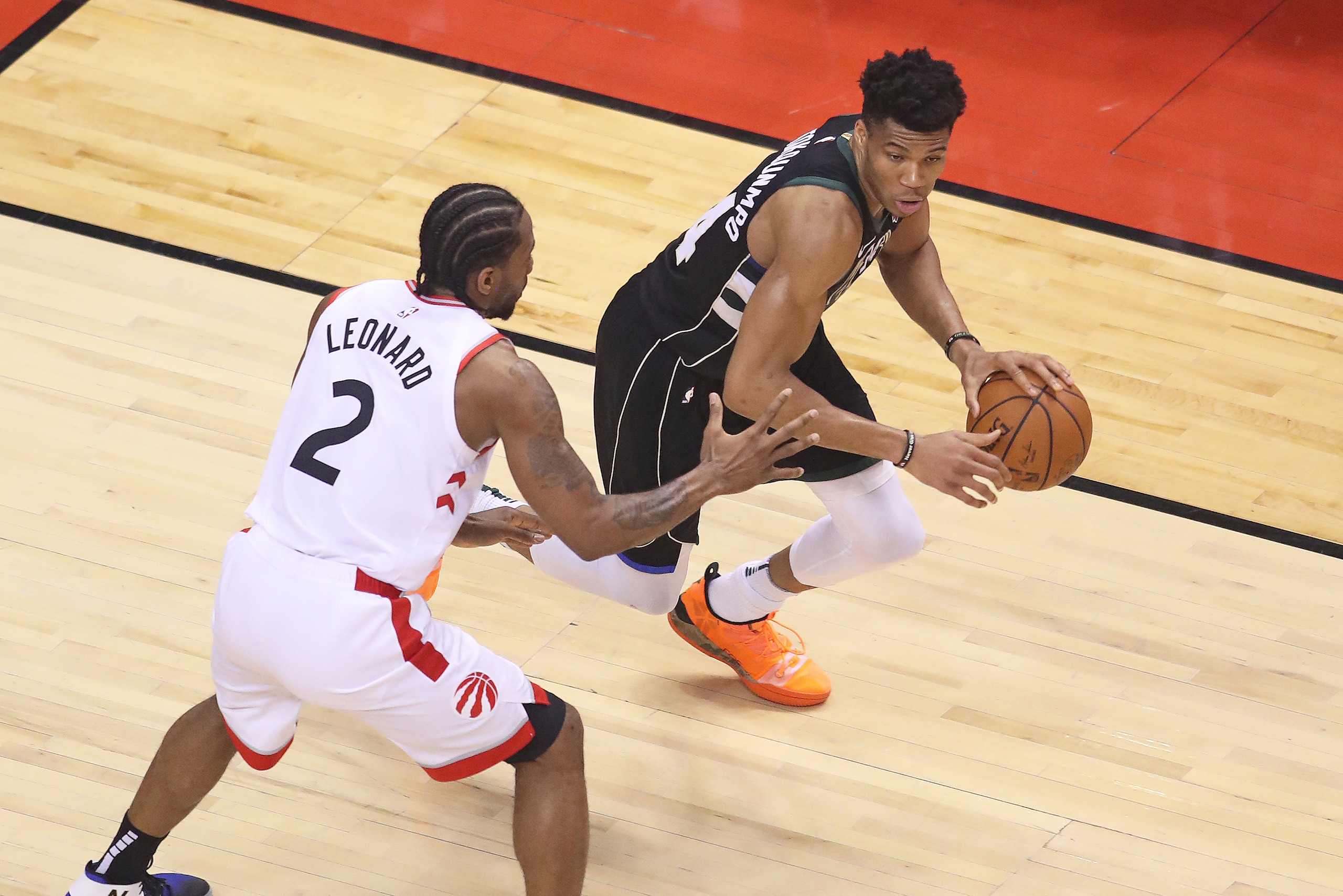 TORONTO, ON - MAY 25:  Giannis Antetokounmpo #34 of the Milwaukee Bucks plays against Kawhi Leonard #2 of the Toronto Raptors during Game Six of the NBA Eastern Conference Final at Scotiabank Arena on May 25, 2019 in Toronto, Ontario, Canada. NOTE TO USER