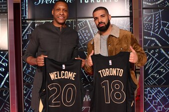 TORONTO, CANADA - JANUARY 17: Drake and Toronto Raptors General Manager Masai Ujiri before the game against the Detroit Pistons on January 17, 2018 at the Air Canada Centre in Toronto, Ontario, Canada.  NOTE TO USER: User expressly acknowledges and agrees