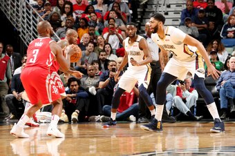 NEW ORLEANS, LA - MARCH 17:  Chris Paul #3 of the Houston Rockets handles the ball against Anthony Davis #23 of the New Orleans Pelicans during the game between the two teams on March 17, 2018 at the Smoothie King Center in New Orleans, Louisiana. NOTE TO
