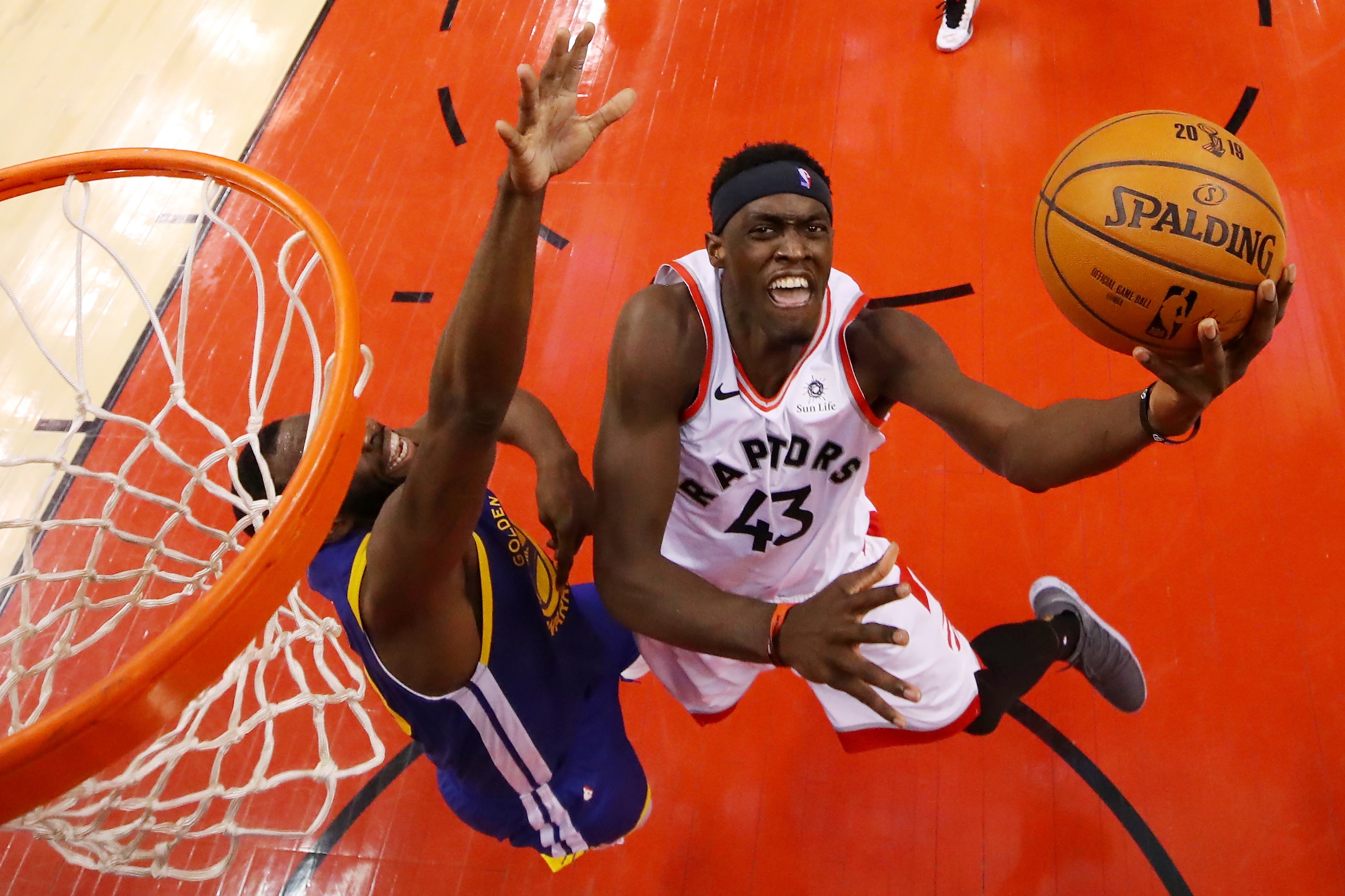 TORONTO, ONTARIO - MAY 30:  Pascal Siakam #43 of the Toronto Raptors attempts a lay up against the Golden State Warriors in the first half during Game One of the 2019 NBA Finals at Scotiabank Arena on May 30, 2019 in Toronto, Canada. NOTE TO USER: User ex