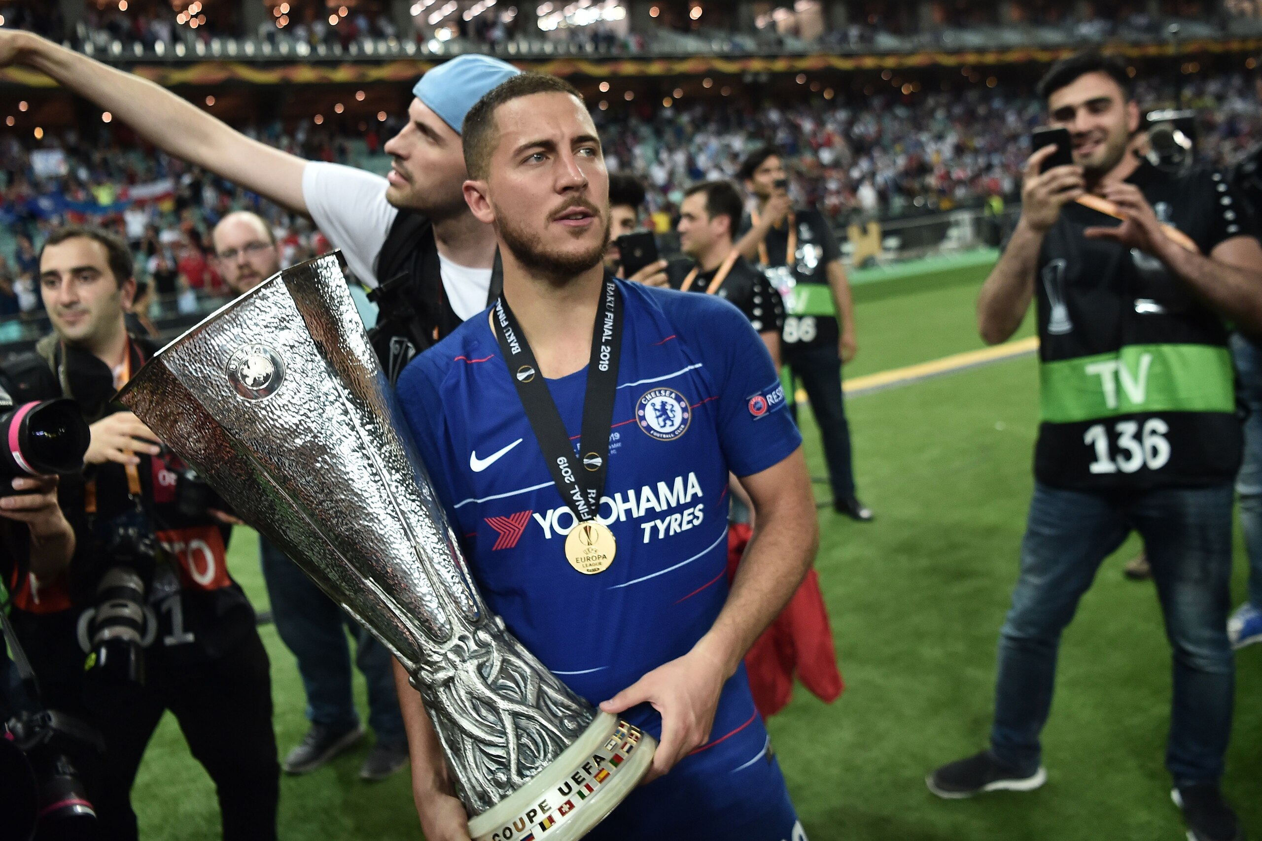 Chelsea's Belgian midfielder Eden Hazard holds the trophy after winning the UEFA Europa League final football match between Chelsea FC and Arsenal FC at the Baku Olympic Stadium in Baku, Azerbaijian, on May 29, 2019. (Photo by OZAN KOSE / AFP)        (Pho