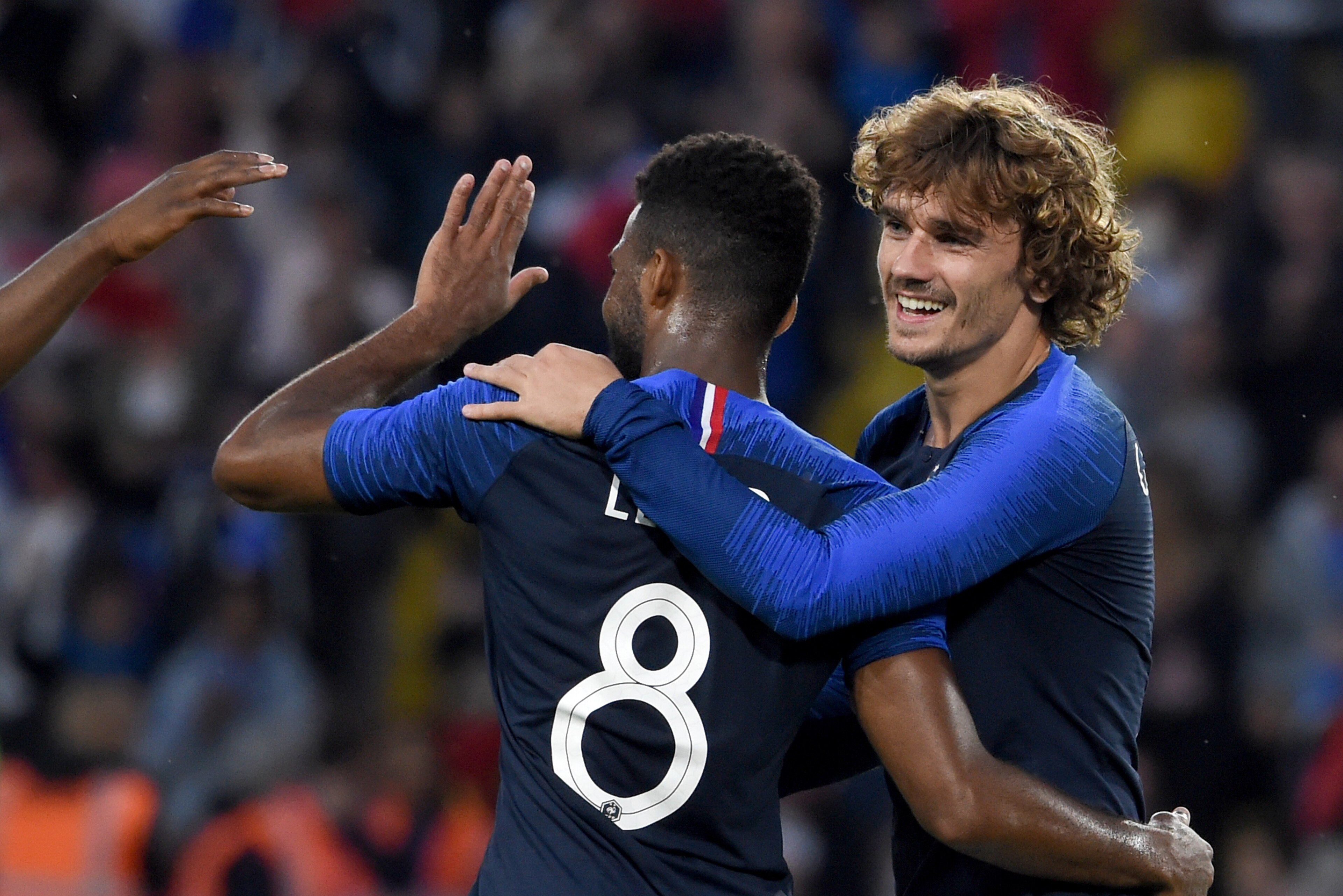France's forward Antoine Griezmann (R) celebrates with his teammate France's forward Thomas Lemar after scoring a goal during the friendly match France against Bolivia at La Beaujoire stadium in Nantes, Western France on June 2, 2019. (Photo by Sebastien 