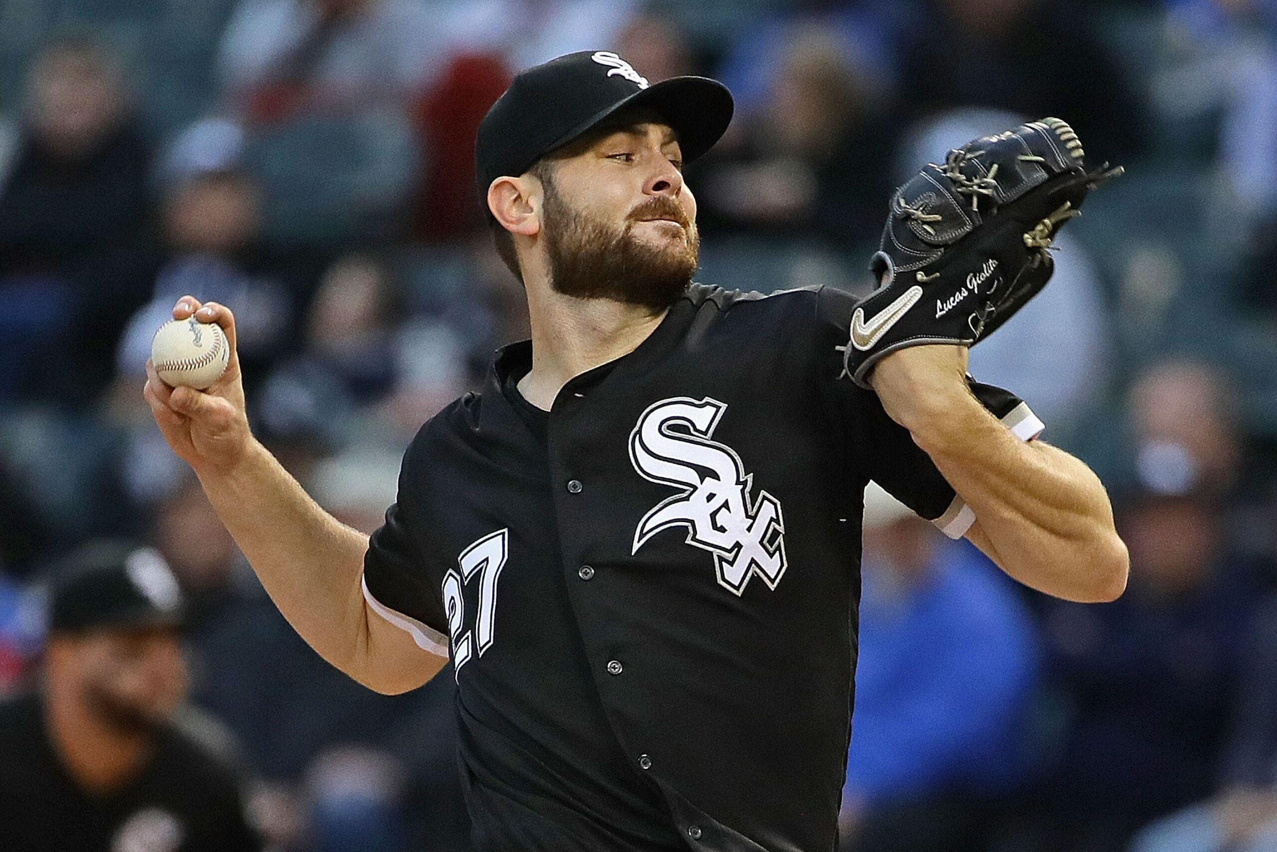 CHICAGO, ILLINOIS - MAY 28: Starting pitcher Lucas Giolito #27 of the Chicago White Sox delivers the ball against the Kansas City Royals at Guaranteed Rate Field on May 28, 2019 in Chicago, Illinois. (Photo by Jonathan Daniel/Getty Images)