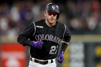 DENVER, COLORADO - MAY 31: Trevor Story #27 of the Colorado Rockies circle the bases after hitting a 2 RBI home run in the seventh inning against the Toronto Blue Jays at Coors Field on May 31, 2019 in Denver, Colorado. (Photo by Matthew Stockman/Getty Im