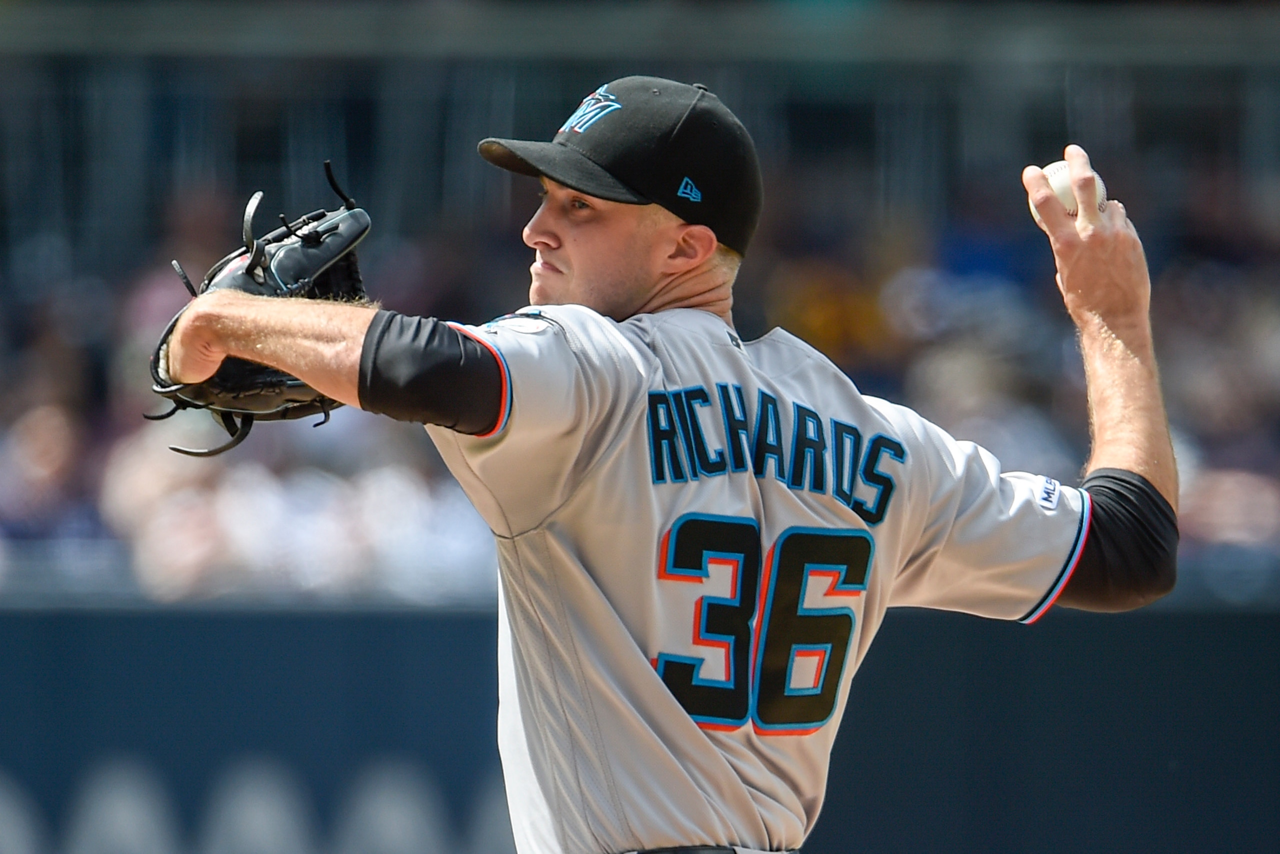 SAN DIEGO, CA - JUNE 2:  Trevor Richards #36 of the Miami Marlins pitches during the first inning of a baseball game against the San Diego Padres at Petco Park June 2, 2019 in San Diego, California.  (Photo by Denis Poroy/Getty Images)