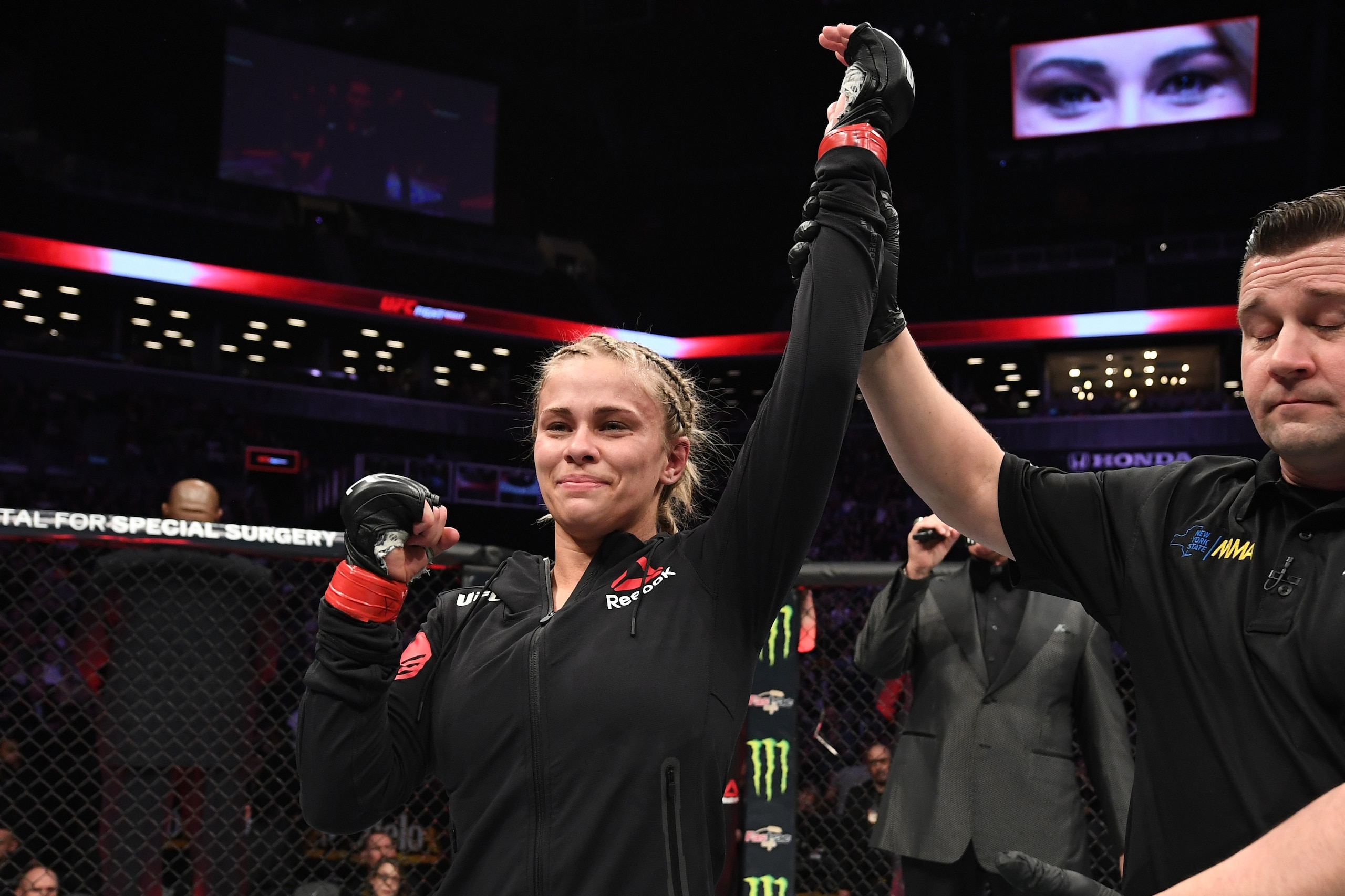 NEW YORK, NY - JANUARY 19: Paige VanZant celebrates her victory over Rachael Ostovich in their women's flyweight bout during the UFC Fight Night event at the Barclays Center on January 19, 2019 in the Brooklyn borough of New York City. (Photo by Josh Hed NEW YORK, NY - JANUARY 19: Paige VanZant celebrates her victory over Rachael Ostovich in their women's flyweight bout during the UFC Fight Night event at the Barclays Center on January 19, 2019 in the Brooklyn borough of New York City. (Photo by Josh Hed