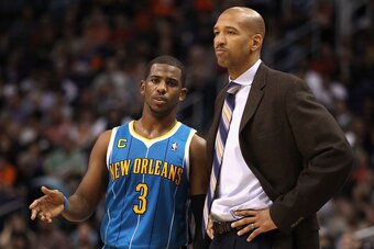 PHOENIX, AZ - JANUARY 30:  Chris Paul #3 of the New Orleans Hornets talks with head coach Monty Williams during the NBA game against the Phoenix Suns at US Airways Center on January 30, 2011 in Phoenix, Arizona. The Suns defeated the Hornets 104-102. NOTE
