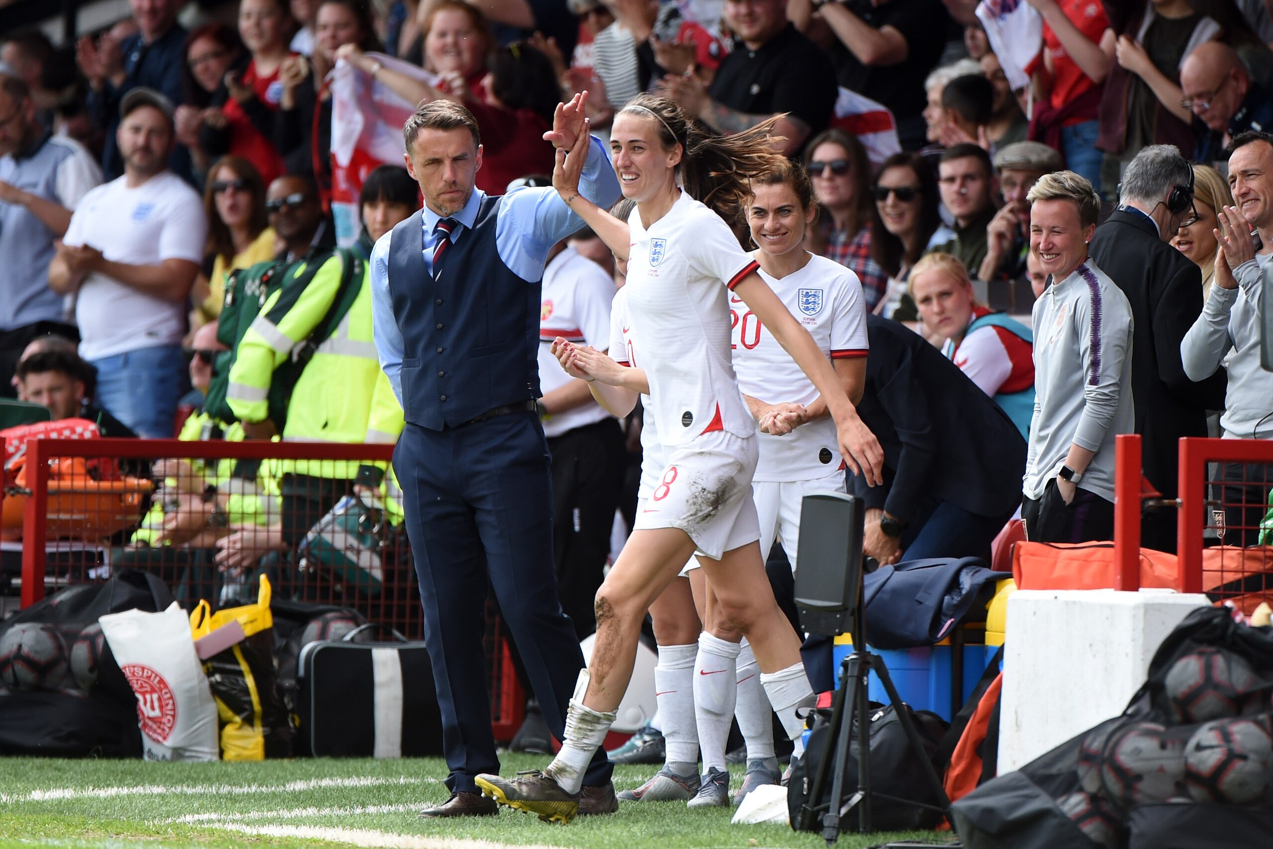 WALSALL, ENGLAND - MAY 25: Philip Neville, Head Coach of England Women congratulates Jill Scott after she scores her team's second goal during the International Friendly between England Women and Denmark Women at Bank's Stadium on May 25, 2019 in Walsal WALSALL, ENGLAND - MAY 25: Philip Neville, Head Coach of England Women congratulates Jill Scott after she scores her team's second goal during the International Friendly between England Women and Denmark Women at Bank's Stadium on May 25, 2019 in Walsal