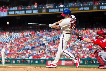 PHILADELPHIA, PA - JUNE 08: Jay Bruce #23 of the Philadelphia Phillies hits a bases loaded two RBI single in the bottom of the first inning against the Cincinnati Reds at Citizens Bank Park on June 8, 2019 in Philadelphia, Pennsylvania. (Photo by Mitchell