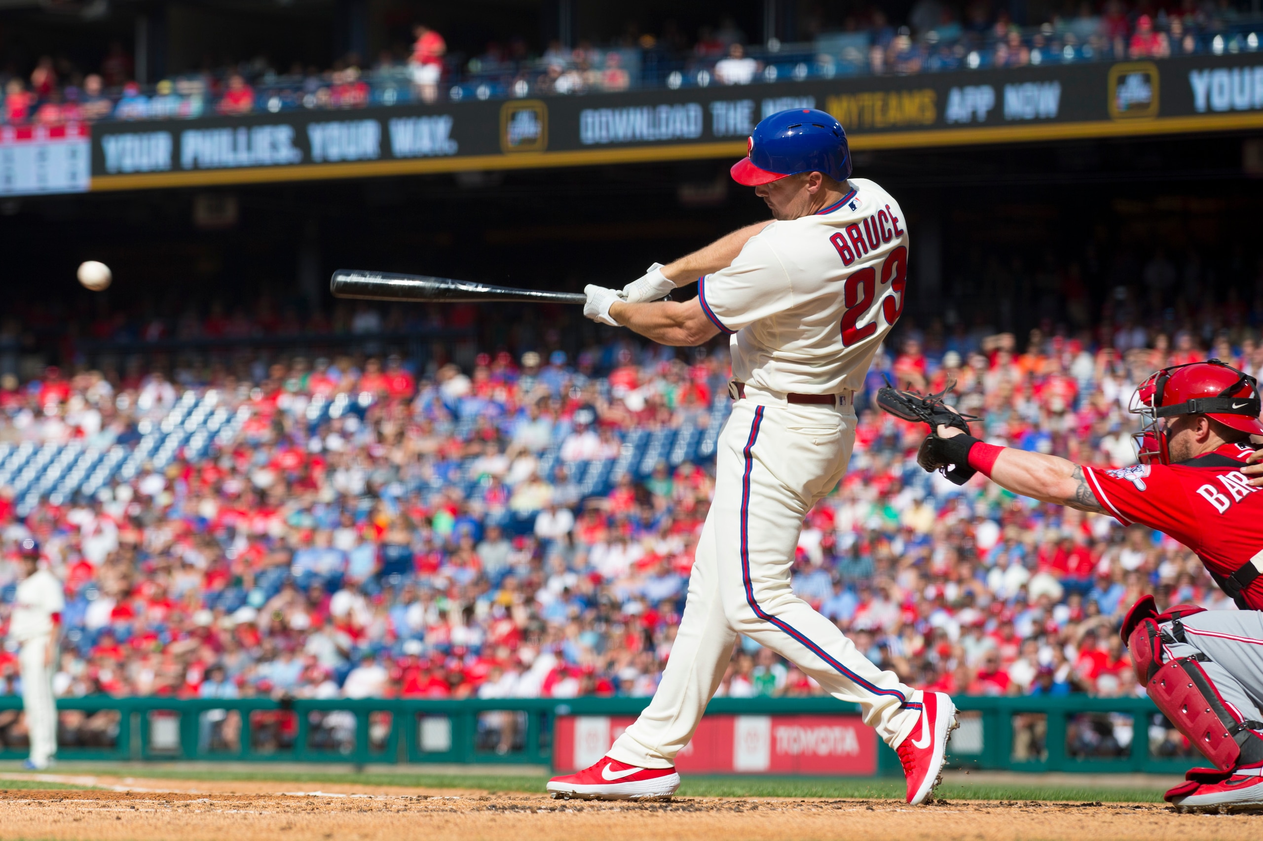 PHILADELPHIA, PA - JUNE 08: Jay Bruce #23 of the Philadelphia Phillies hits a bases loaded two RBI single in the bottom of the first inning against the Cincinnati Reds at Citizens Bank Park on June 8, 2019 in Philadelphia, Pennsylvania. (Photo by Mitchell