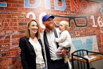 CHICAGO, ILLINOIS - JUNE 07:  Craig Kimbrel of the Chicago Cubs with his wife Ashely and their daughter Lydia Joy, 19mts, following an introductory press conference at Wrigley Field on June 07, 2019 in Chicago, Illinois. (Photo by Nuccio DiNuzzo/Getty Ima