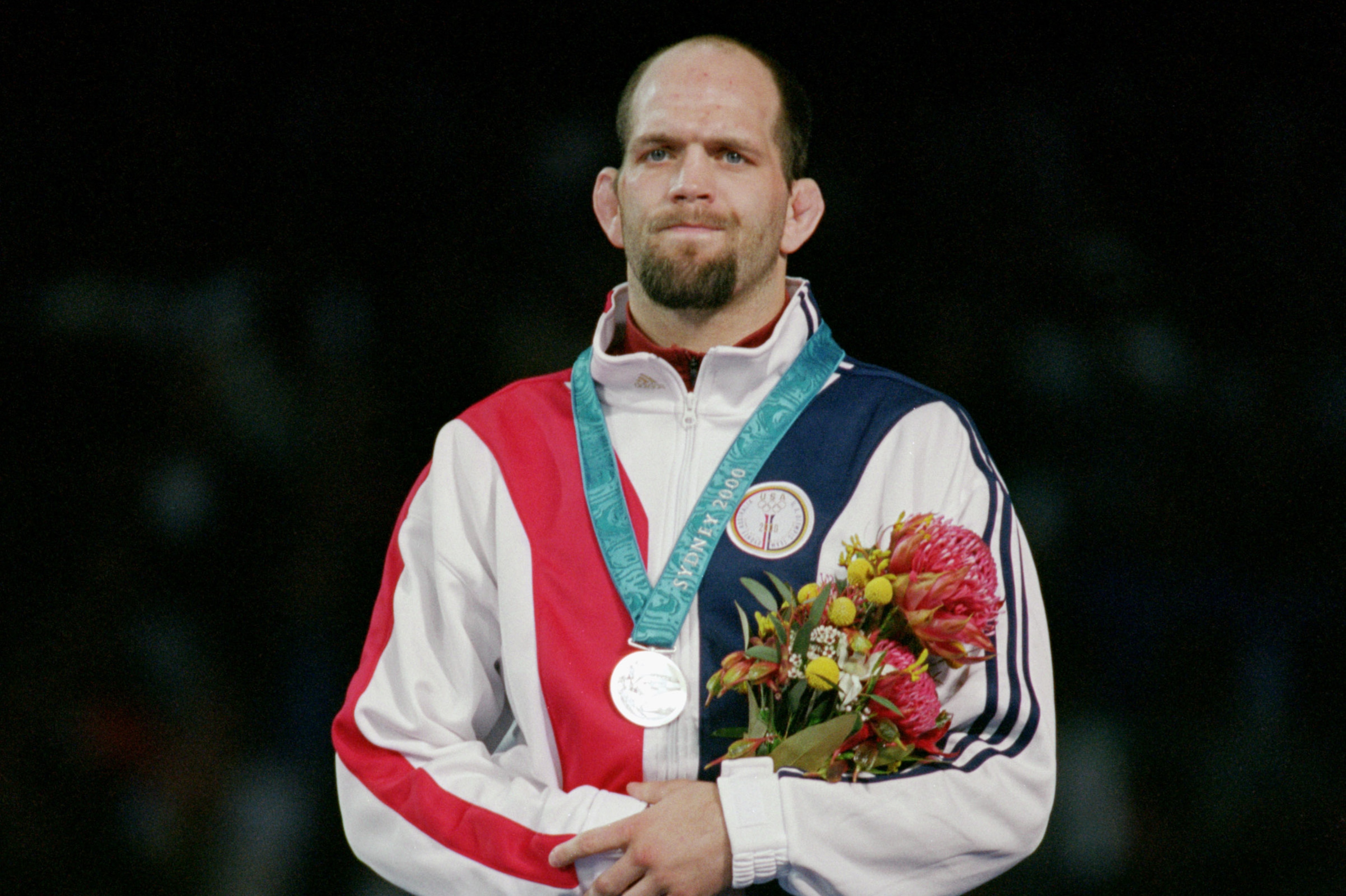 SYDNEY - SEPTEMBER 26:  Matt James Lindland of the USA receives a Bronze medal in the Men's Greco Roman Wrestling during the Sydney 2000 Olympic Games on September 26,2000 at the Exhibition Hall in Sydney, Austraila. (Photo by Al Bello/Getty Images)