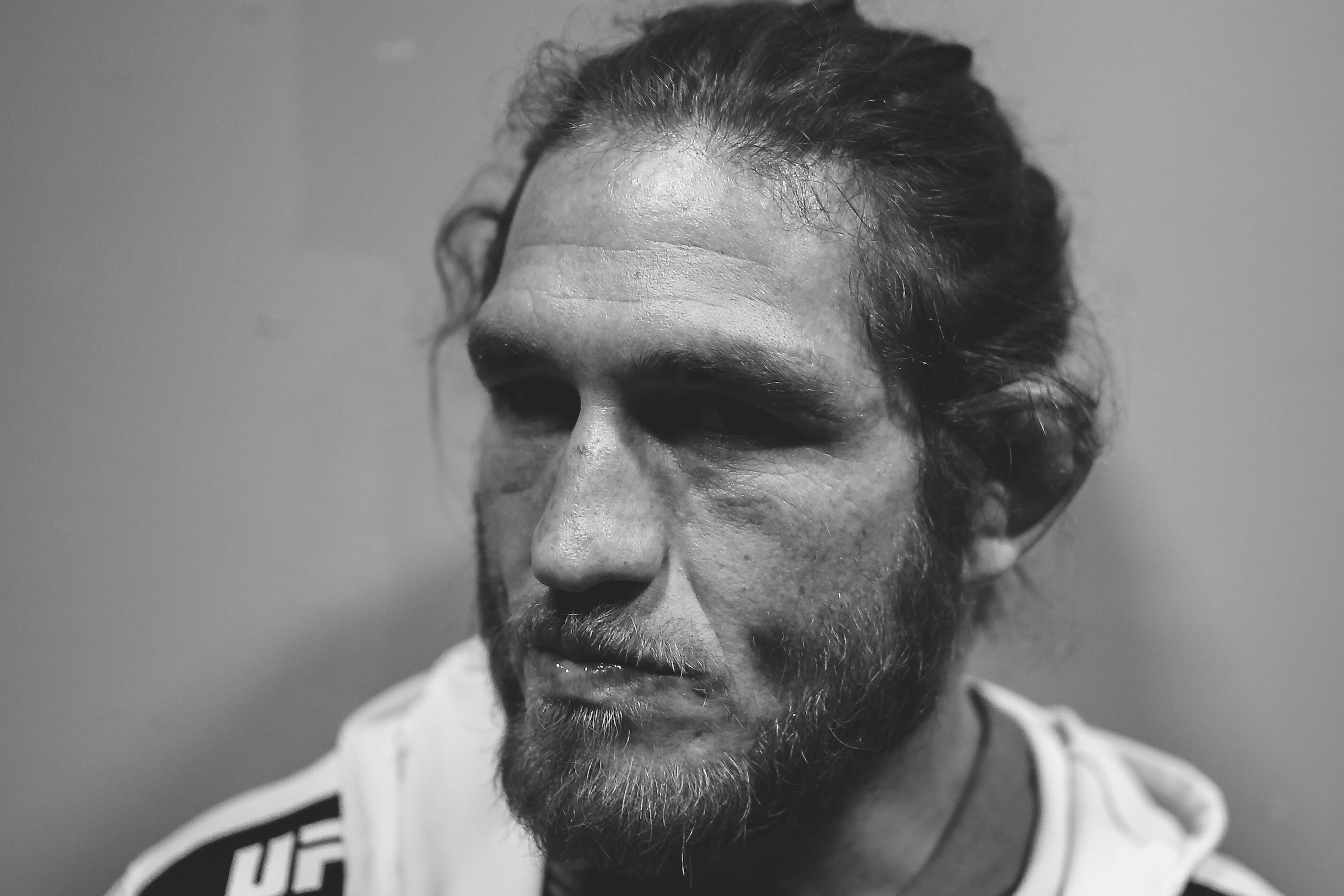 Tom Lawlor's hair can't fully hide his cauliflower ear.