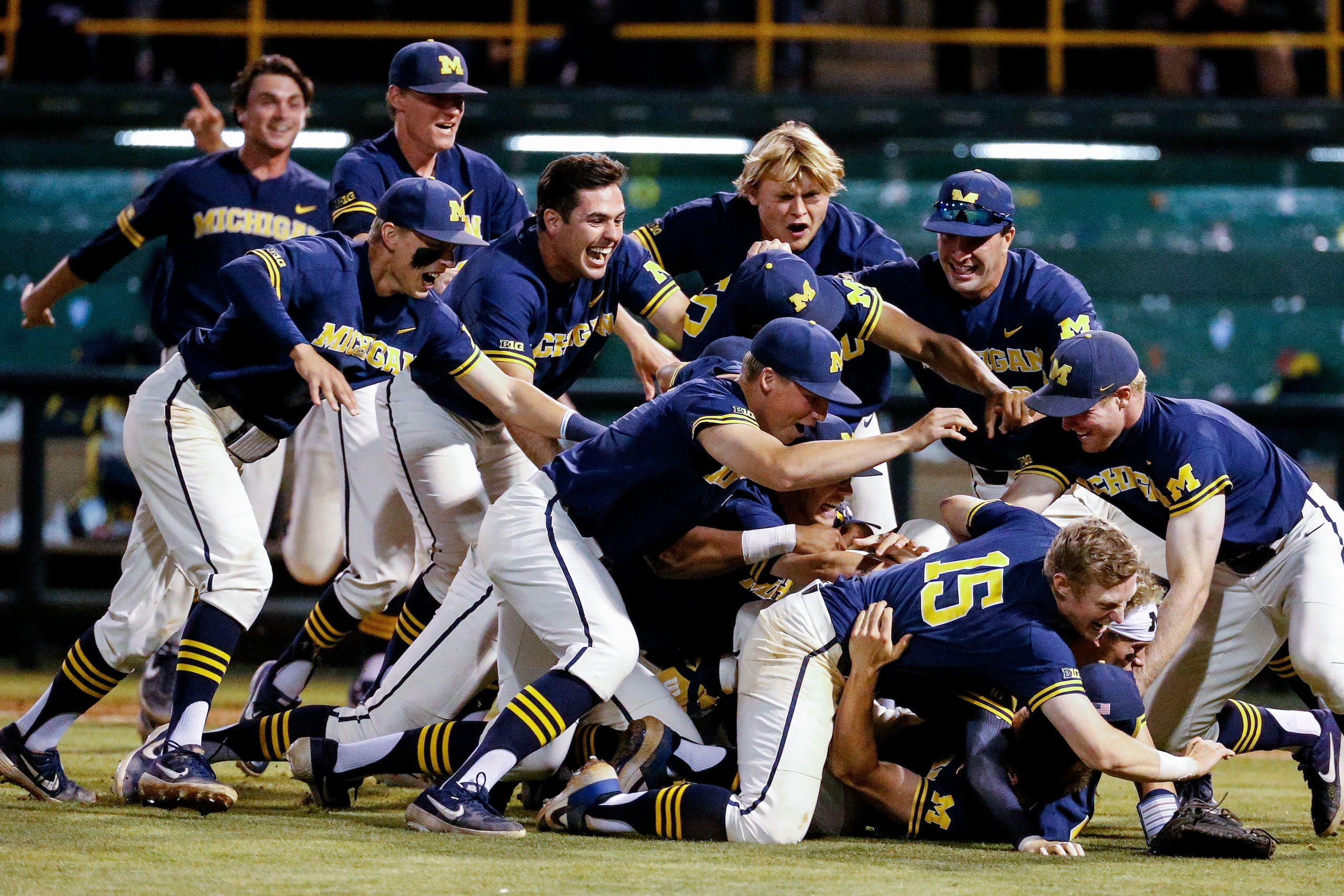 Michigan advanced to the College World Series by shocking top-ranked UCLA.
