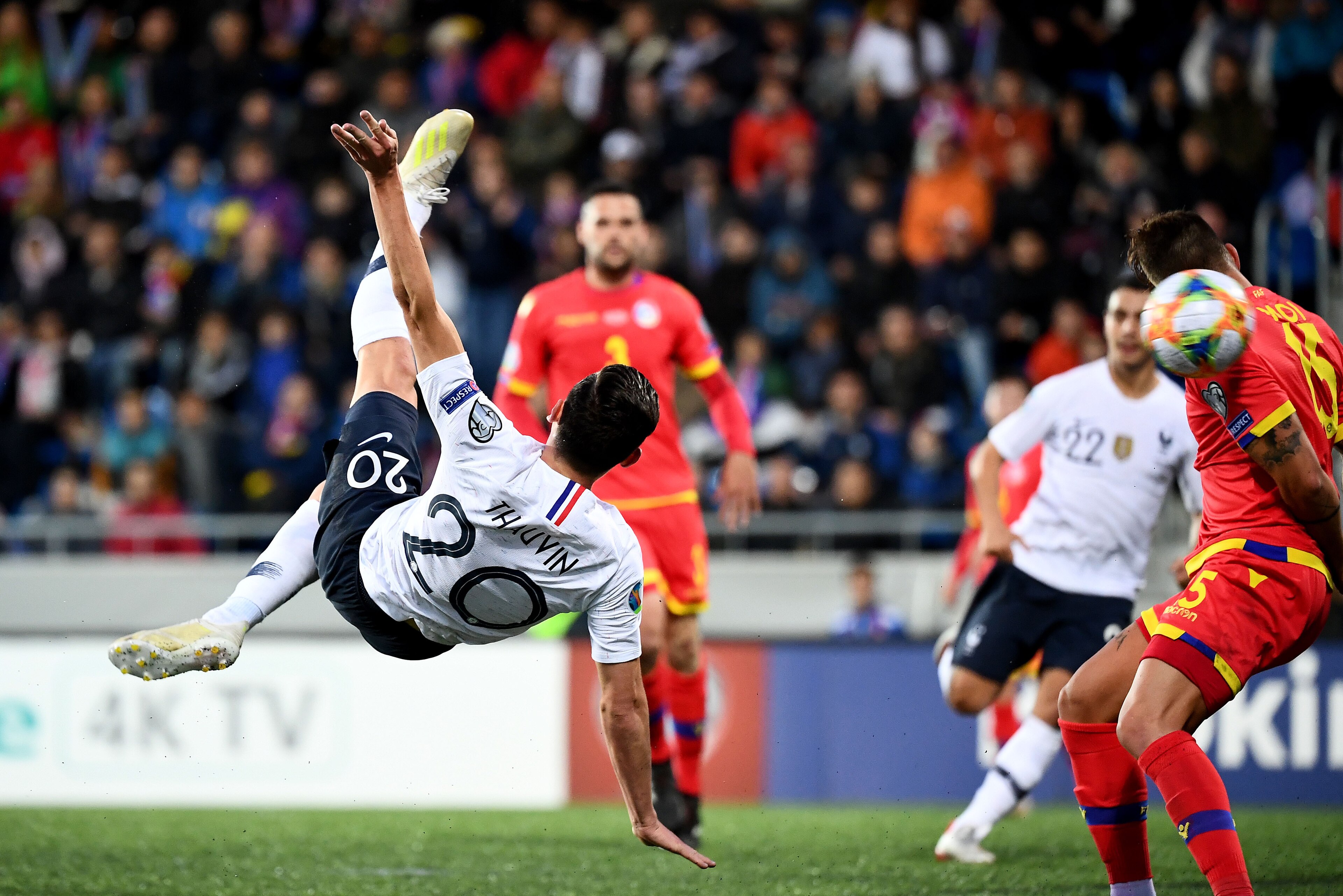 France's forward Florian Thauvin (L) shoot and scores during the UEFA Euro 2020 qualification football match between Andorra and France at the National stadium in Andorra La Vella, on June 11, 2019. (Photo by FRANCK FIFE / AFP)        (Photo credit should