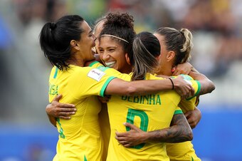 GRENOBLE, FRANCE - JUNE 09: Cristiane of Brazil celebrates with teammates after scoring her team's third goal during the 2019 FIFA Women's World Cup France group C match between Brazil and Jamaica at Stade des Alpes on June 09, 2019 in Grenoble, France. (