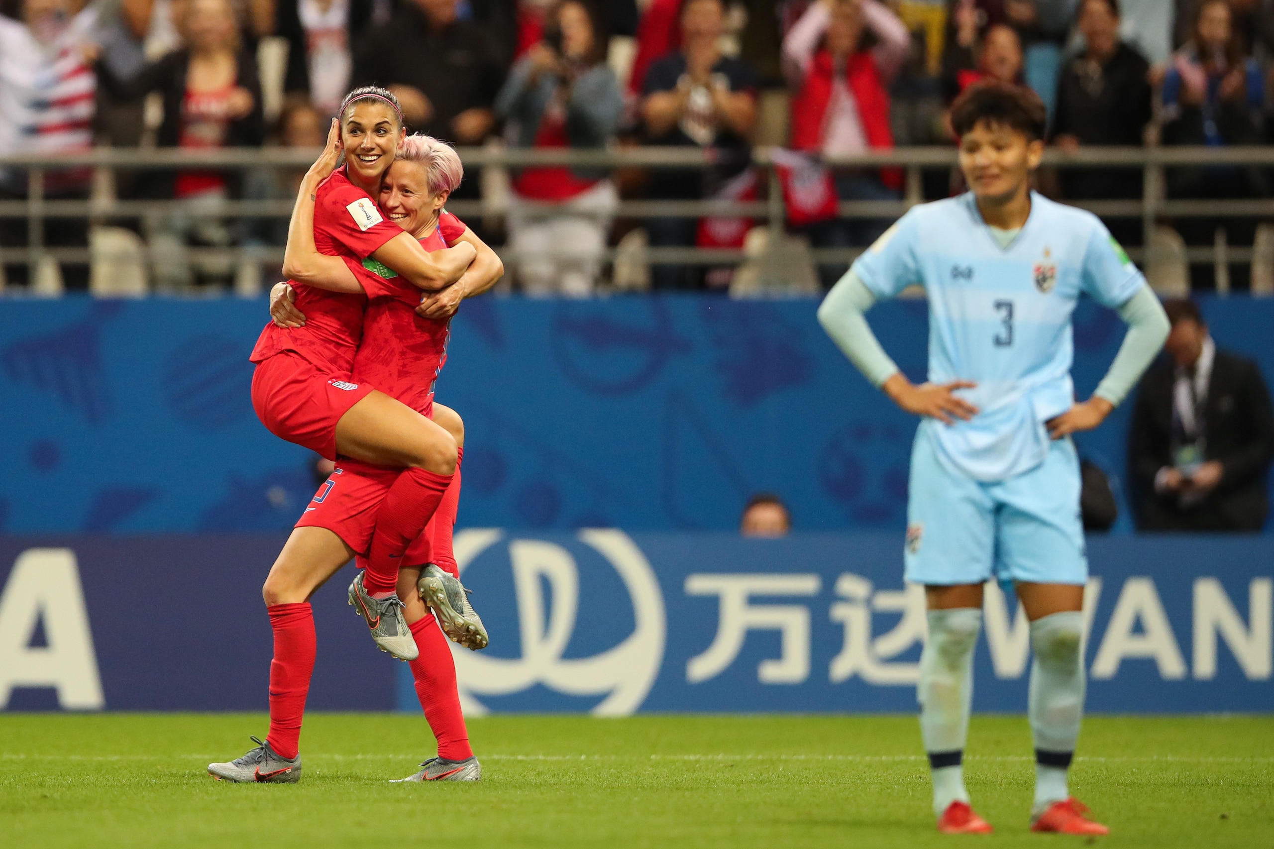 REIMS, FRANCE - JUNE 11: Alex Morgan of USA celebrates with Megan Rapinoe of USA after scoring a goal to make it 12-0 during the 2019 FIFA Women's World Cup France group F match between USA and Thailand at Stade Auguste Delaune on June 11, 2019 in Reims, REIMS, FRANCE - JUNE 11: Alex Morgan of USA celebrates with Megan Rapinoe of USA after scoring a goal to make it 12-0 during the 2019 FIFA Women's World Cup France group F match between USA and Thailand at Stade Auguste Delaune on June 11, 2019 in Reims,