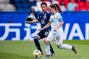 PARIS, FRANCE - JUNE 10: Estefania Banini of Argentina (R) in action against Risa Shimizu of Japan (L) during the 2019 FIFA Women's World Cup France group D match between Argentina and Japan at Parc des Princes on June 10, 2019 in Paris, France. (Photo by