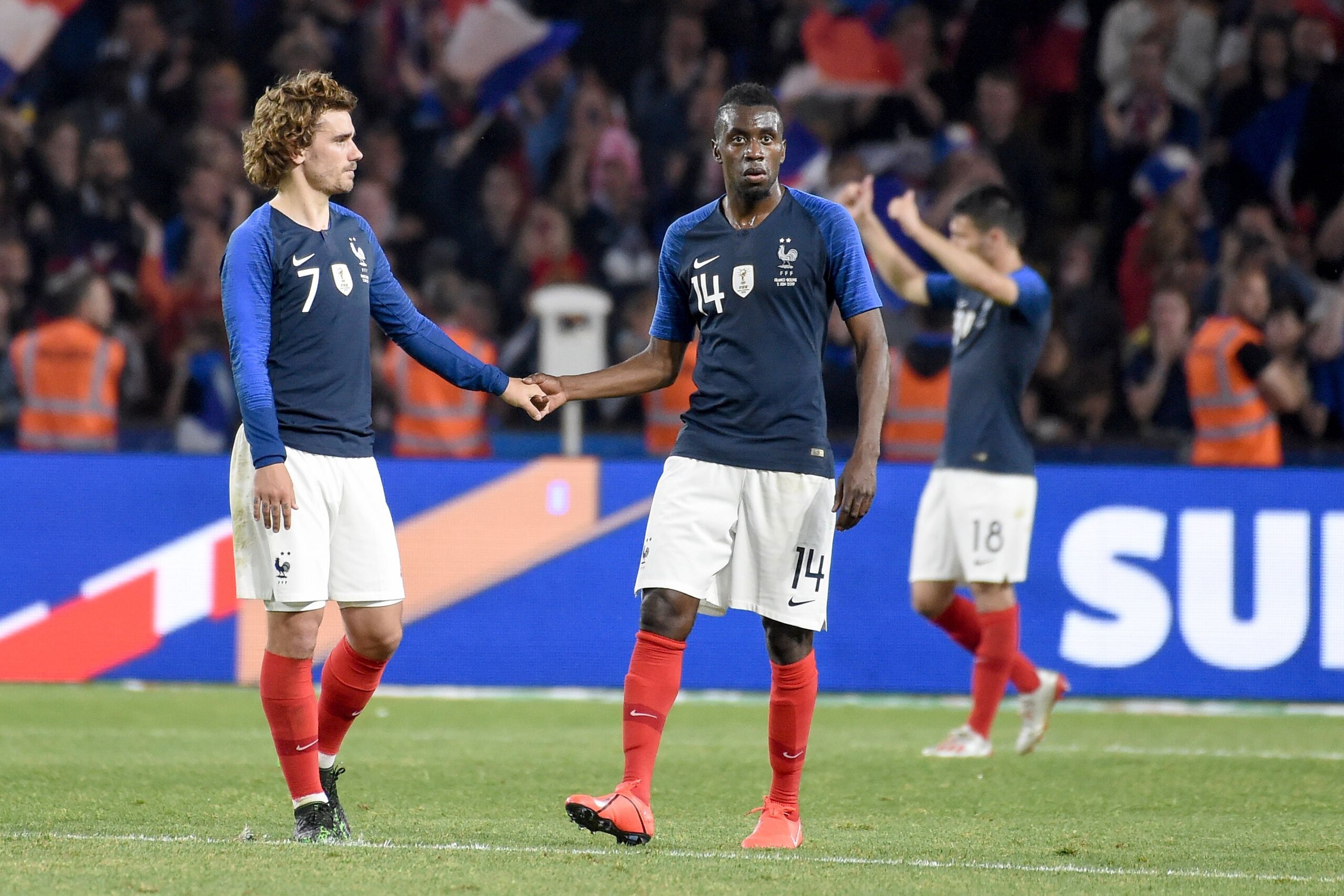 France's forward Antoine Griezmann (L) and France's midfielder Blaise Matuidi celebrate at the end of the friendly match between France and Bolivia at La Beaujoire stadium in Nantes, Western France on June 2, 2019. (Photo by Sebastien SALOM-GOMIS / AFP)  