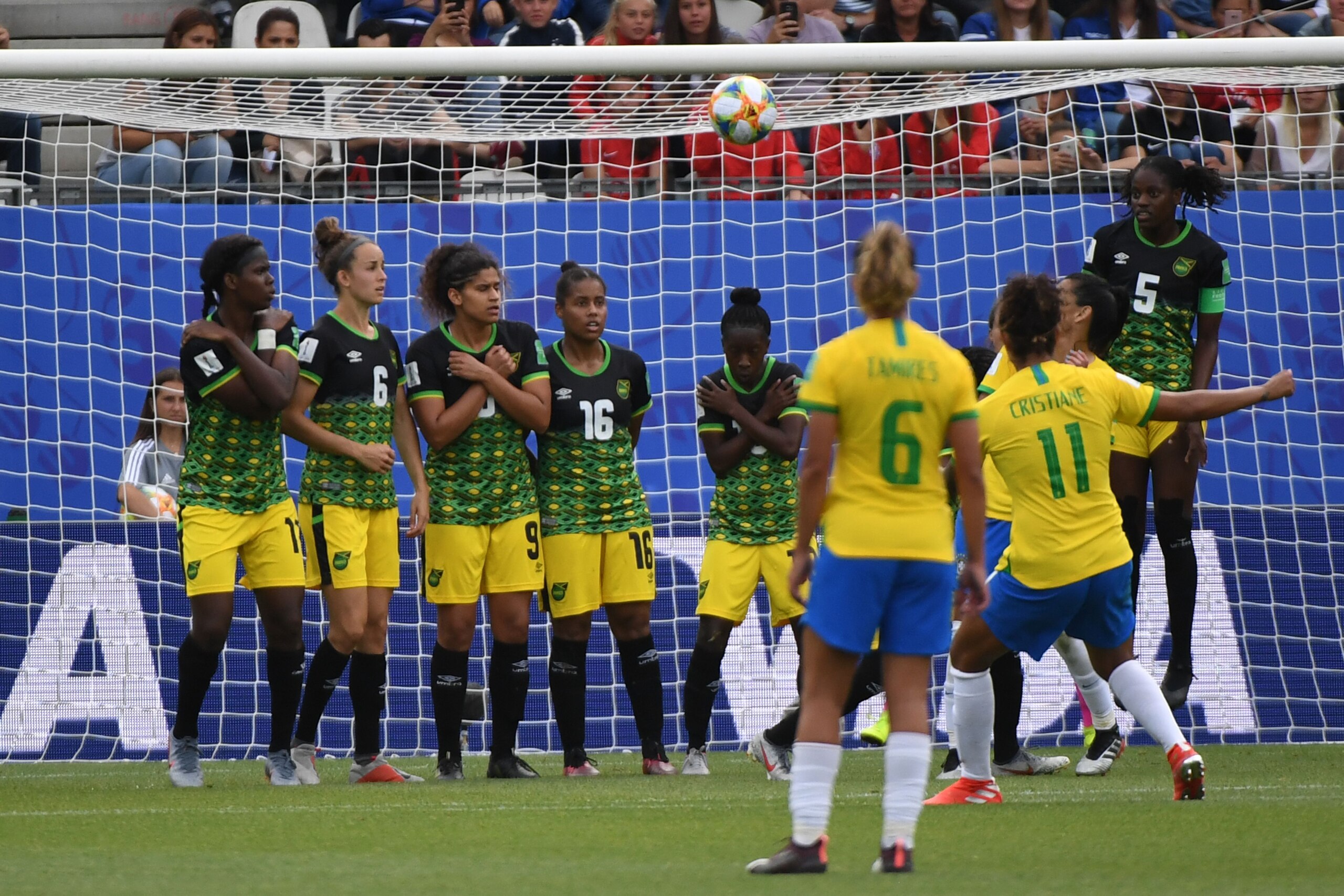 Brazil's forward Cristiane (11) kicks a free kick to score a goal during the France 2019 Women's World Cup Group C football match between Brazil and Jamaica on June 9, 2019, at the Alpes Stadium in Grenoble, central-eastern France. (Photo by Jean-Pierre C