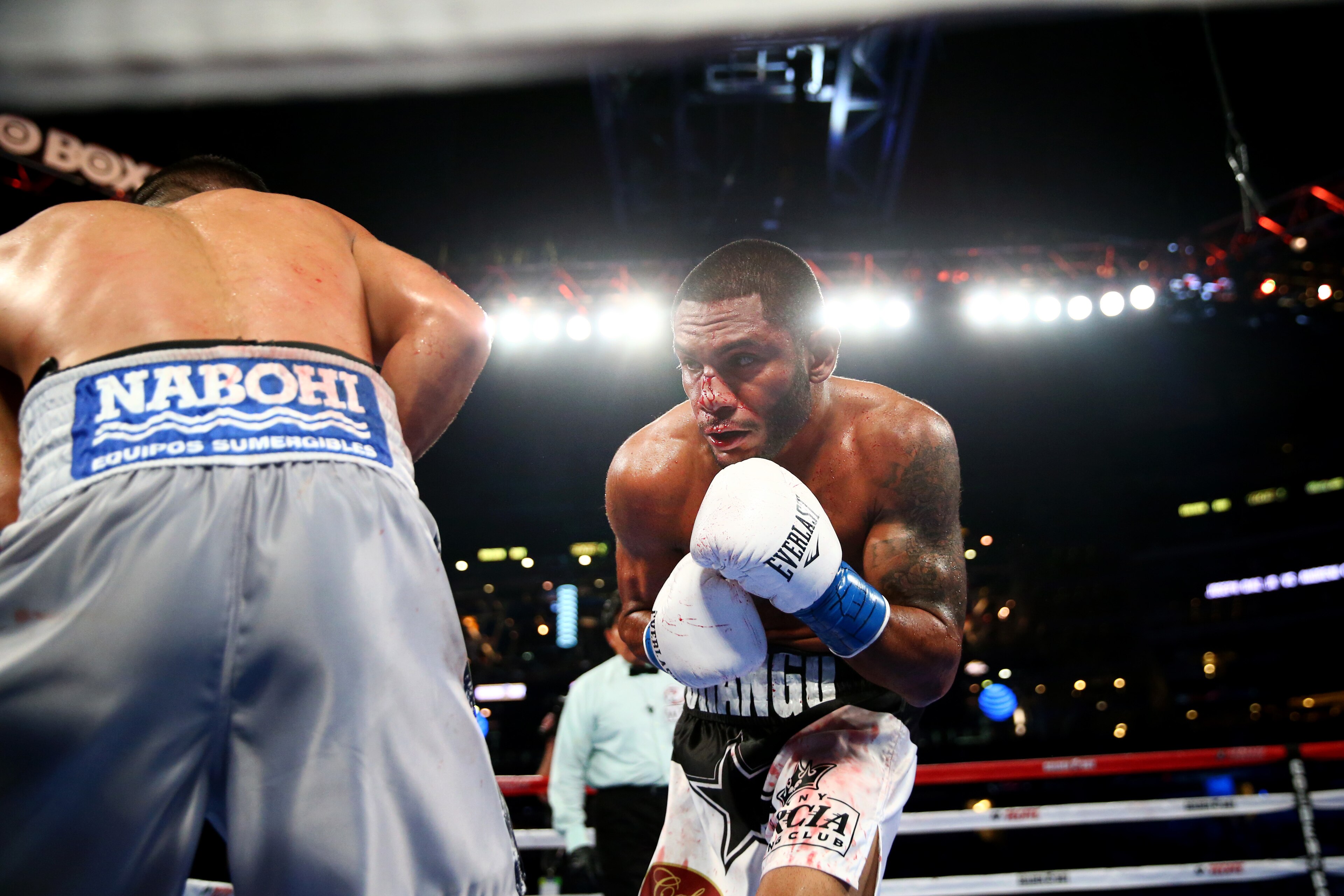 ARLINGTON, TX - SEPTEMBER 17: Joseph Diaz Jr., left,  fights Andrew Cancio, right, during the NABF Featherweight fight at AT&T Stadium on September 17, 2016 in Arlington, Texas. (Photo by Ronald Martinez/Getty Images)