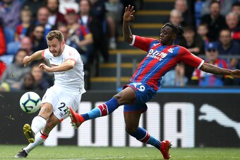 LONDON, ENGLAND - MAY 12: Aaron Wan-Bissaka of Crystal Palace is challenged by Ryan Fraser of AFC Bournemouth during the Premier League match between Crystal Palace and AFC Bournemouth at Selhurst Park on May 12, 2019 in London, United Kingdom. (Photo by 