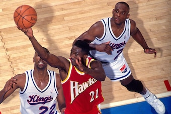 SACRAMENTO - FEBRUARY 11: Dominique Wilkins #21 of the Atlanta Hawks shoots against the Sacramento Kings on February 11, 1993 at Arco Arena in Sacramento, California. NOTE TO USER: User expressly acknowledges and agrees that, by downloading and/or using t