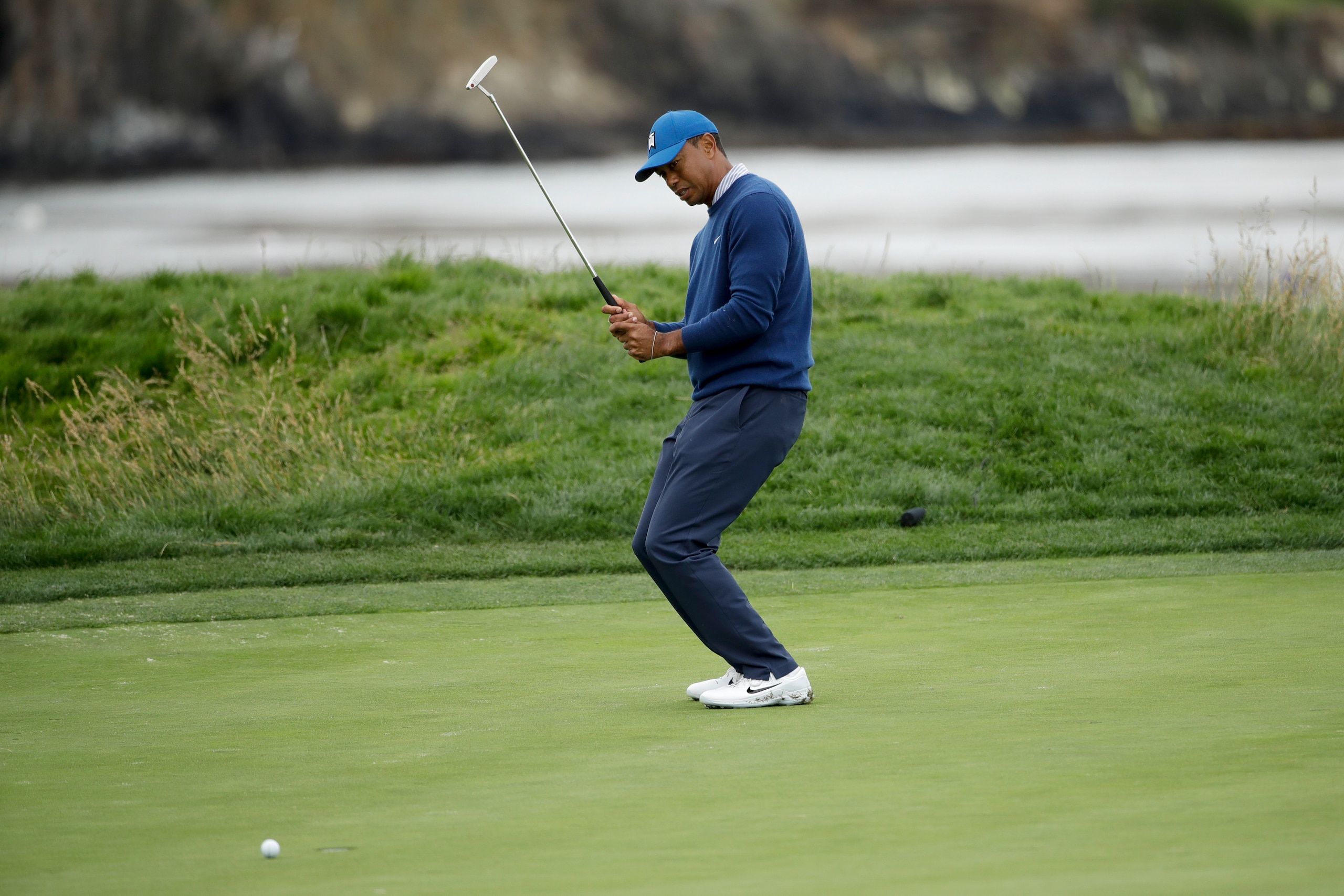 Tiger endured a slew of narrow misses Friday.