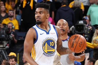 OAKLAND, CA - JUNE 5: Jacob Evans #10 of the Golden State Warriors handles the ball against the Toronto Raptors during Game Three of the NBA Finals on June 5, 2019 at ORACLE Arena in Oakland, California. NOTE TO USER: User expressly acknowledges and agree