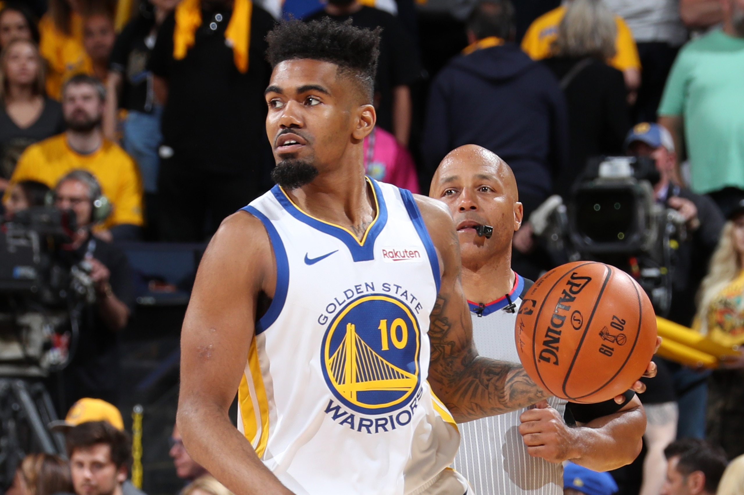 OAKLAND, CA - JUNE 5: Jacob Evans #10 of the Golden State Warriors handles the ball against the Toronto Raptors during Game Three of the NBA Finals on June 5, 2019 at ORACLE Arena in Oakland, California. NOTE TO USER: User expressly acknowledges and agree