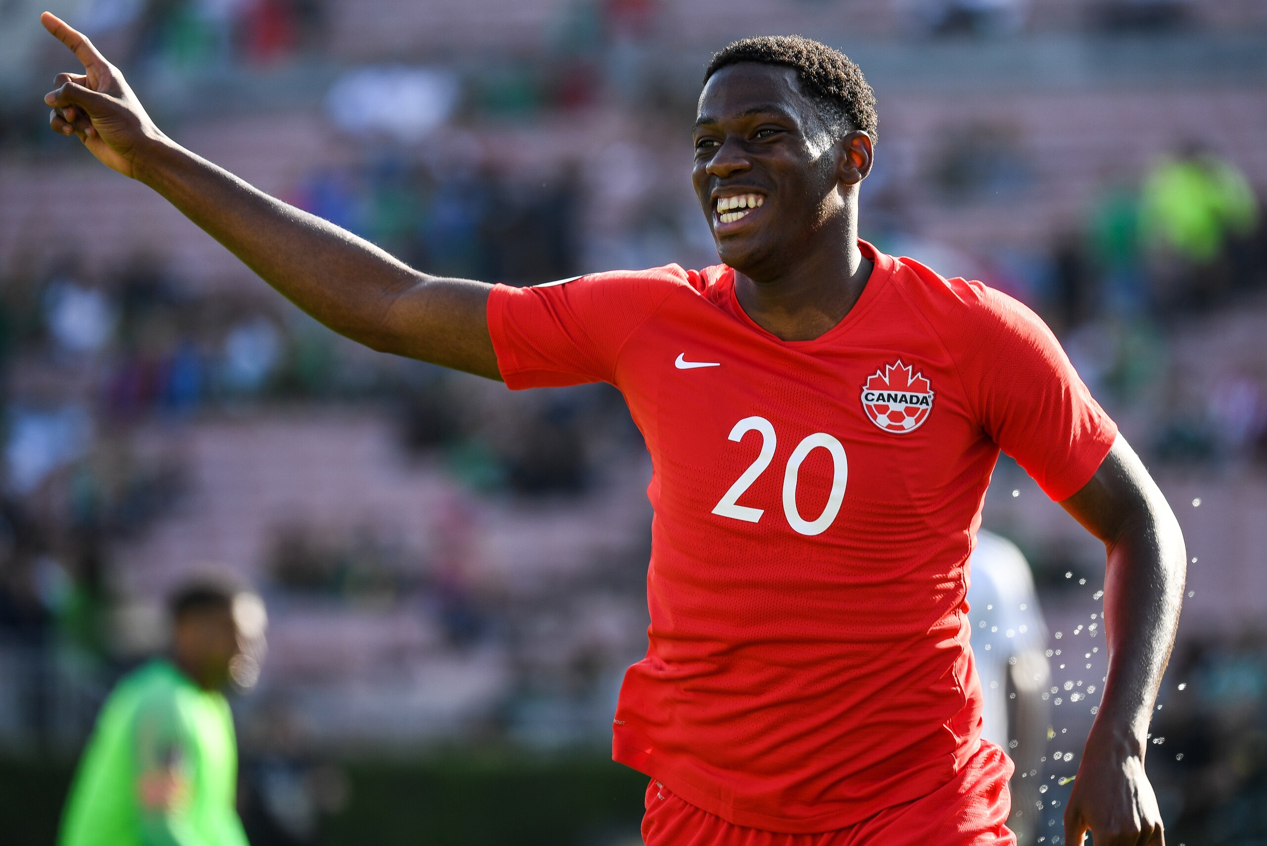 PASADENA, CA - JUNE 15: Jonathan David #20 of Canada celebrates his goal during the 2019 CONCACAF Gold Cup Group A match between Canada and Martinique at the Rose Bowl on June 15, 2019 in Pasadena, California.  Canada won the match 4-0  (Photo by Shaun Cl
