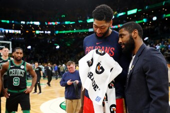 BOSTON, MA - DECEMBER 10: Kyrie Irving #11 of the Boston Celtics and Anthony Davis #23 of the New Orleans Pelicans talk after the game between the Celtics and Pelicans at TD Garden on December 10, 2018 in Boston, Massachusetts. (Photo by Maddie Meyer/Gett