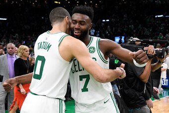 BOSTON, MA - APRIL 17: Jayson Tatum #0 hugs Jaylen Brown #7 of the Boston Celtics Game Two of Round One of the 2019 NBA Playoffs against the Boston Celtics on April 17, 2019 at the TD Garden in Boston, Massachusetts.  NOTE TO USER: User expressly acknowle