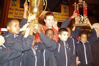 Ferland Mendy (centre, holding trophy) and Presnel Kimpembe (far right)