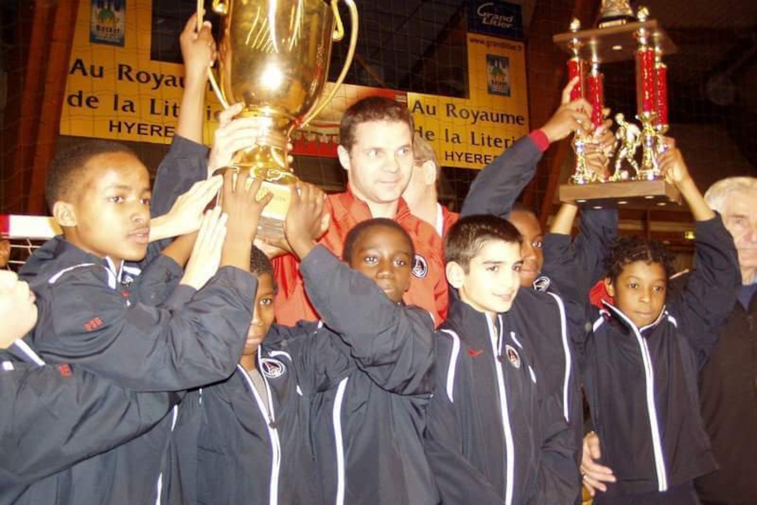 Ferland Mendy (centre, holding trophy) and Presnel Kimpembe (far right)
