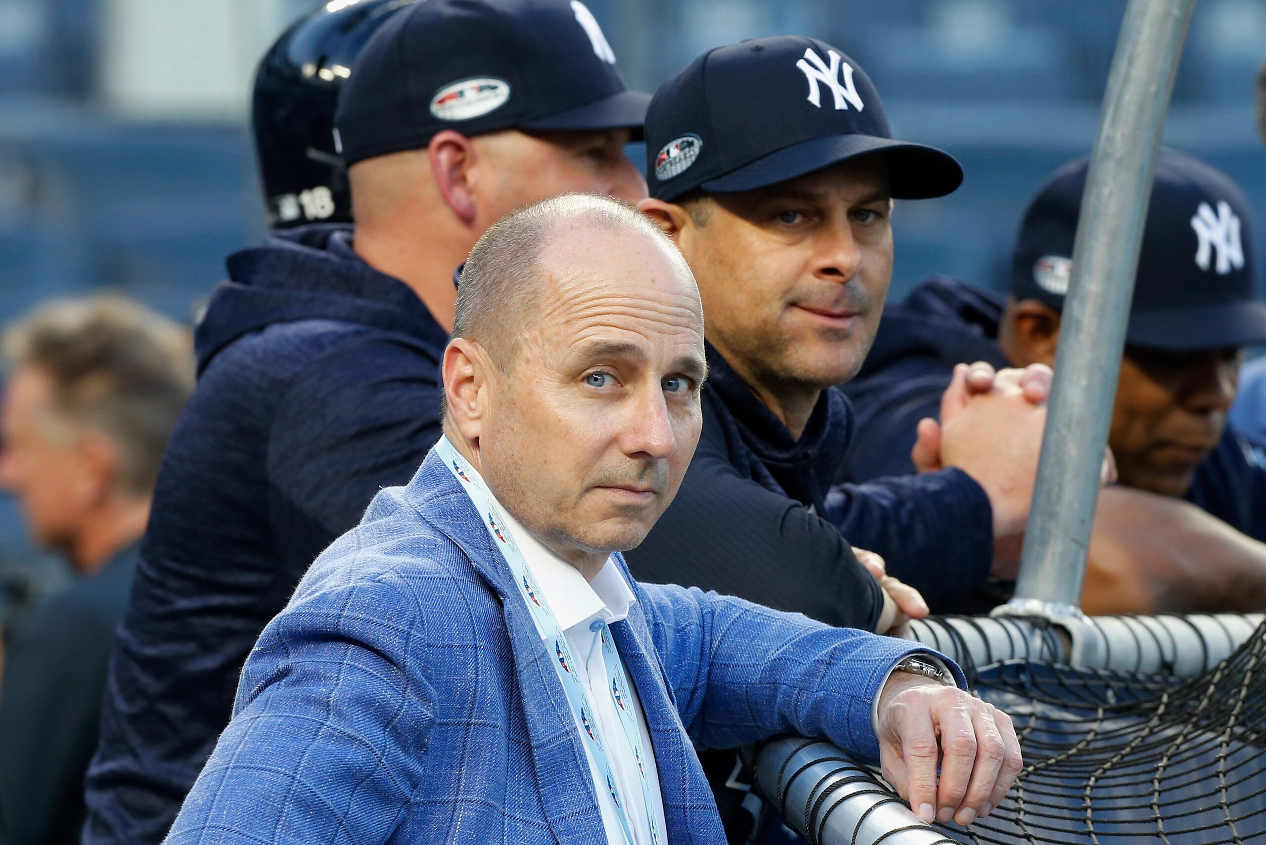 NEW YORK, NY - OCTOBER 09:  (NEW YORK DAILIES OUT)   General Manager Brian Cashman and Manager Aaron Boone #17 of the New York Yankees during batting practice before Game Four of the American League Division Series against the Boston Red Sox at Yankee Sta