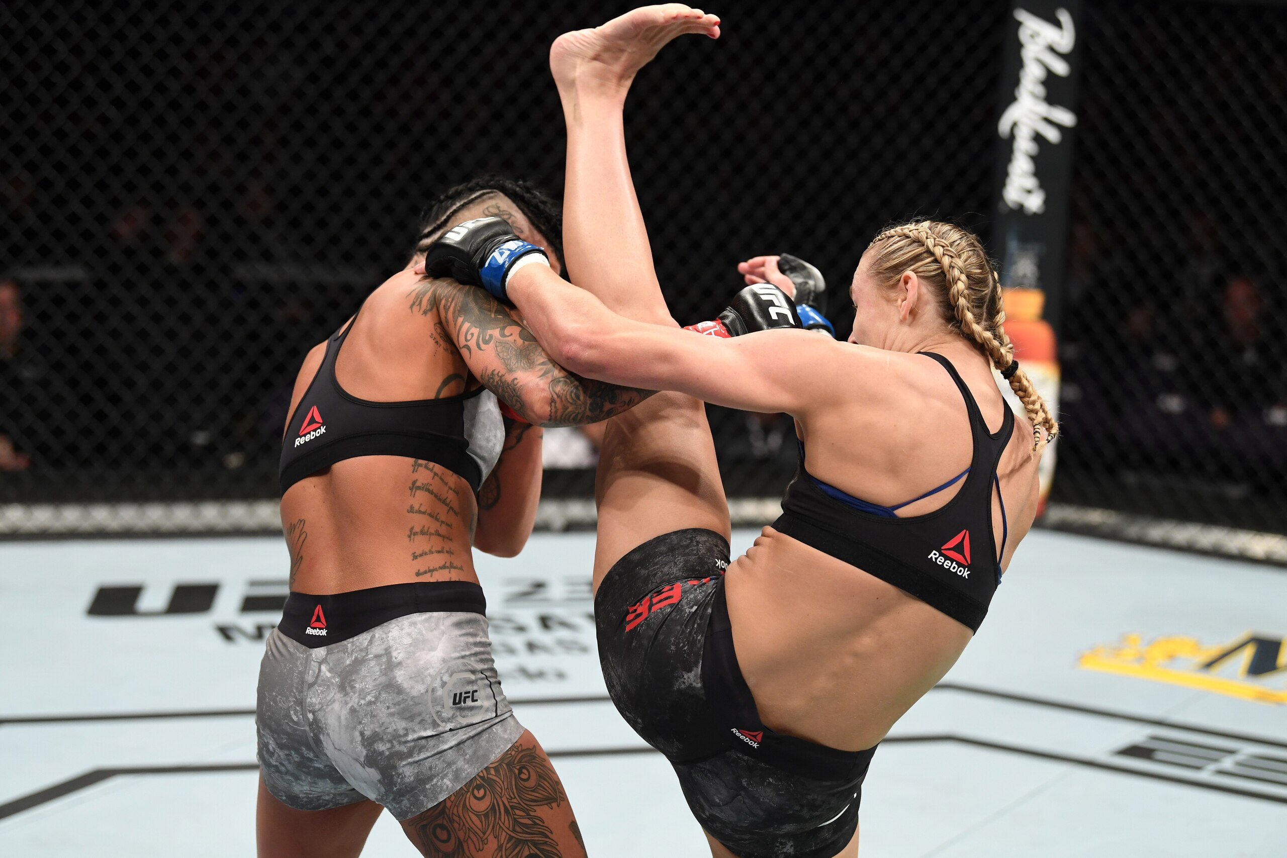 PHOENIX, ARIZONA - FEBRUARY 17:  (R-L) Andrea Lee kicks Ashlee Evans-Smith in their women's flyweight bout during the UFC Fight Night event at Talking Stick Resort Arena on February 17, 2019 in Phoenix, Arizona. (Photo by Josh Hedges/Zuffa LLC/Zuffa LLC v