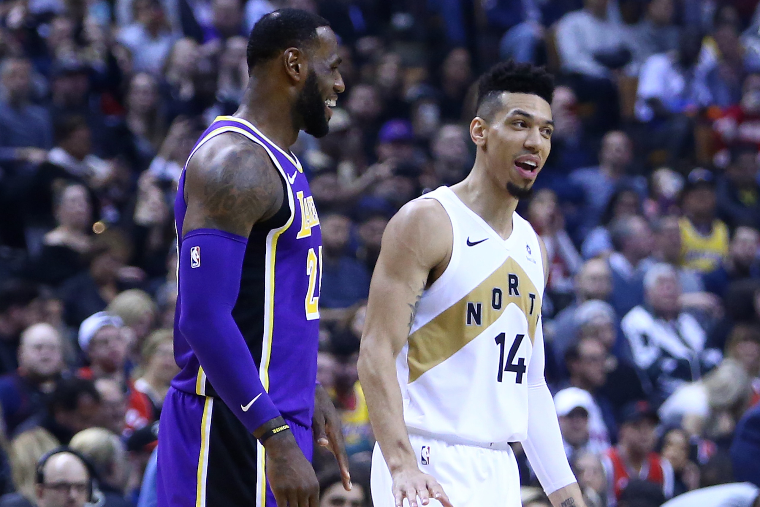 TORONTO, ON - MARCH 14:  LeBron James #23 of the Los Angeles Lakers laughs with Danny Green #14 of the Toronto Raptors prior to the opening tip off of an NBA game at Scotiabank Arena on March 14, 2019 in Toronto, Canada.  NOTE TO USER: User expressly ackn