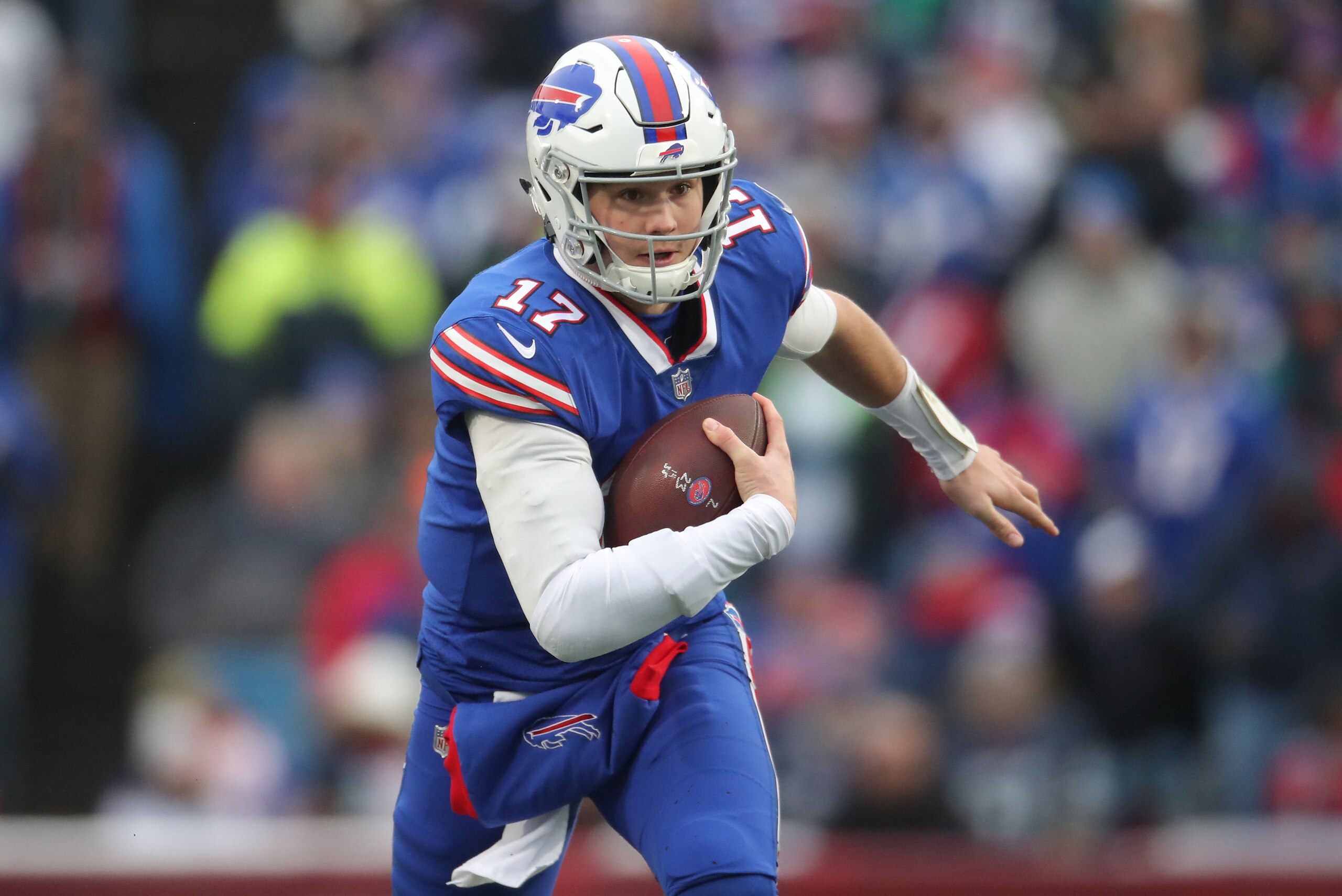 BUFFALO, NY - DECEMBER 30: Josh Allen #17 of the Buffalo Bills runs with the ball in the second quarter during NFL game action against the Miami Dolphins at New Era Field on December 30, 2018 in Buffalo, New York. (Photo by Tom Szczerbowski/Getty Images)