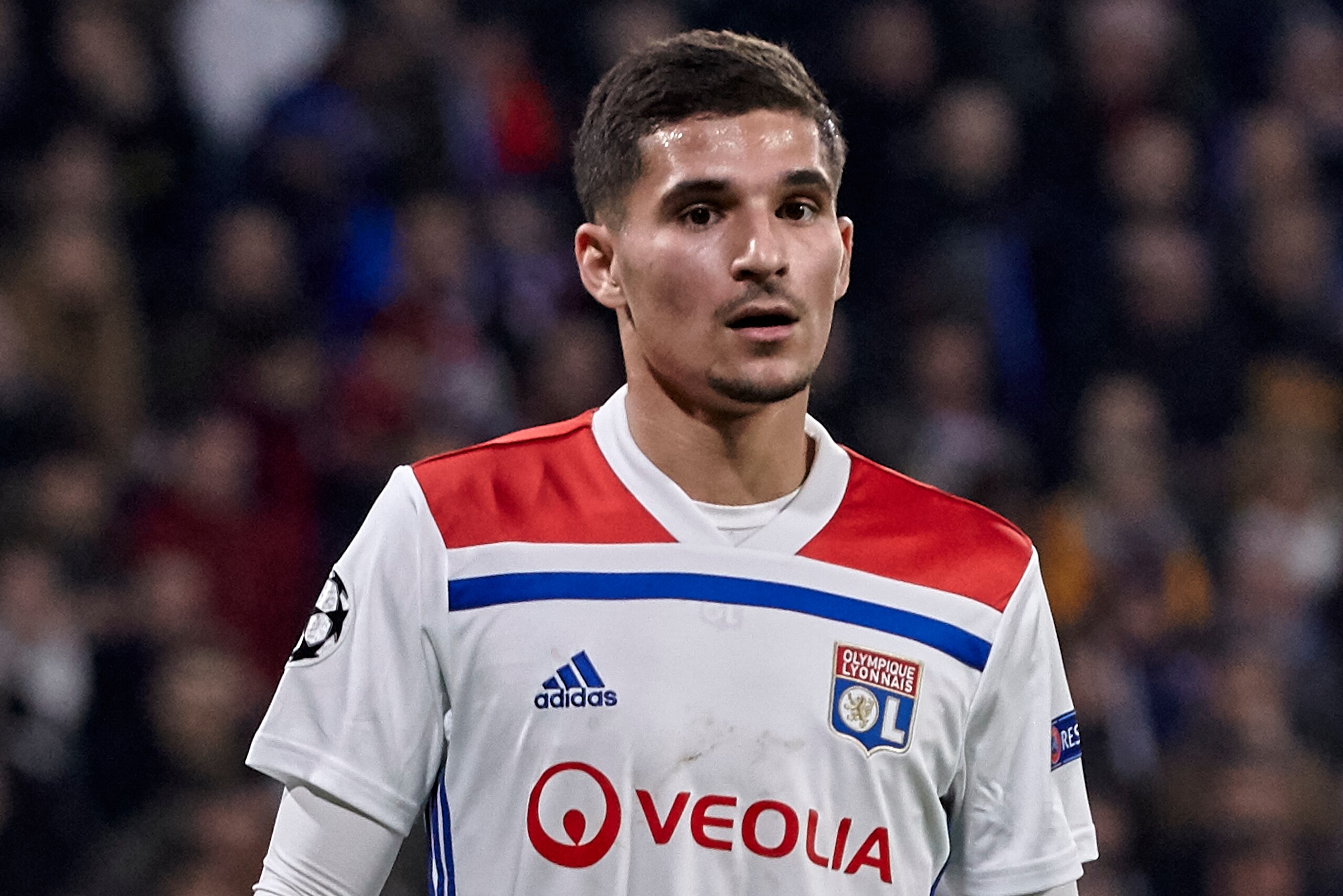 LYON, FRANCE - FEBRUARY 19: Houssem Aouar of Olympique Lyonnais looks on during the UEFA Champions League Round of 16 First Leg match between Olympique Lyonnais and FC Barcelona at Groupama Stadium on February 19, 2019 in Lyon, . (Photo by Quality Sport I